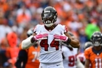 Oct 9, 2016; Denver, CO, USA; Atlanta Falcons outside linebacker Vic Beasley (44) celebrates a sack in the second half against the Denver Broncos at Sports Authority Field at Mile High. The Falcons defeated the Broncos 23-16. Mandatory Credit: Ron Chenoy-