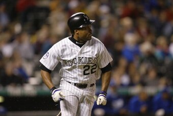 DENVER - SEPTEMBER 12:  Terry Shumpert #22 of the Colorado Rockies watches the ball after getting a hit during the game against the Los Angeles Dodgers on September 12, 2002 at Coors Field in Denver, Colorado.  The Rockies defeated the Dodgers 7-1.  (Phot