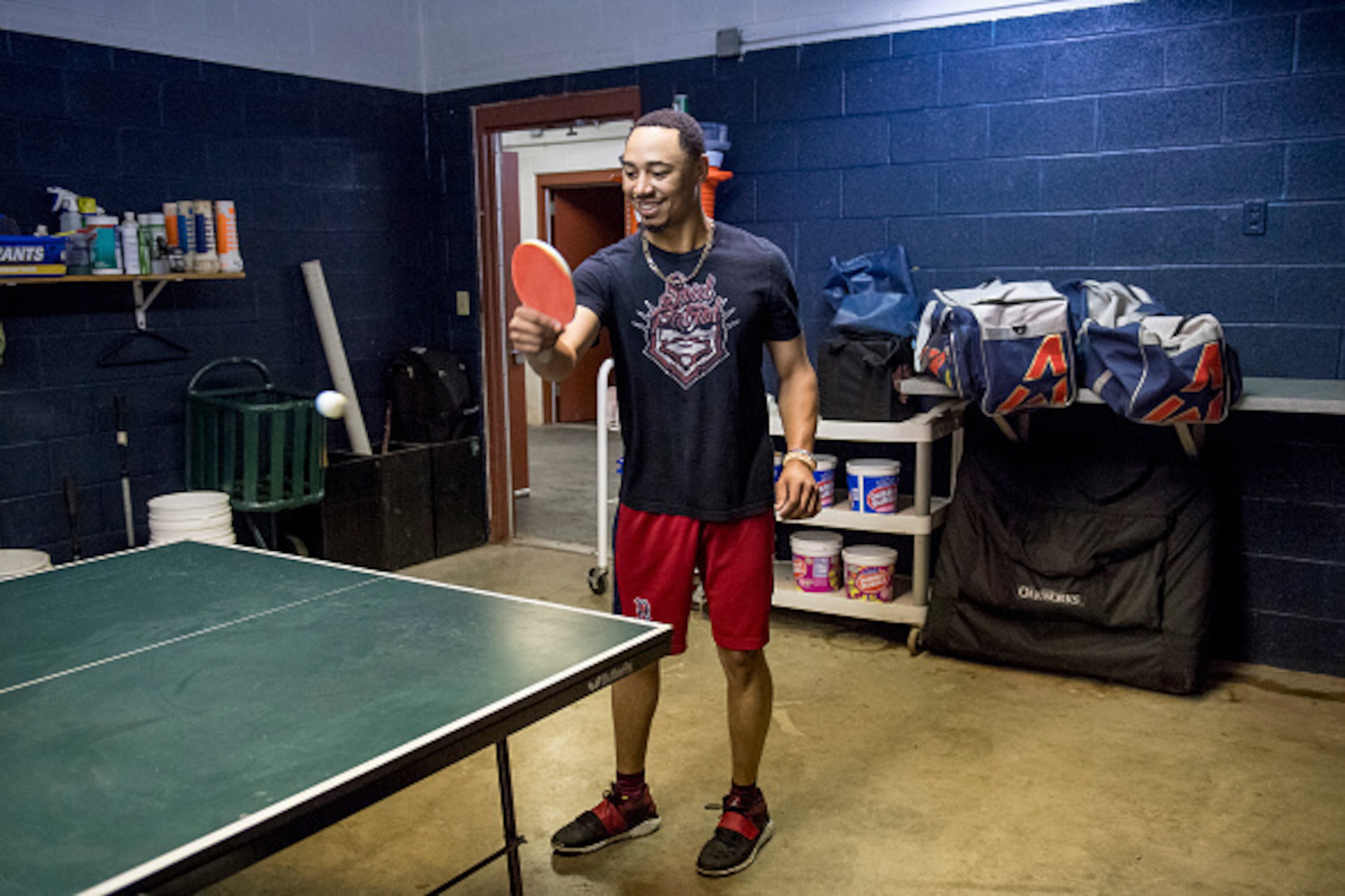 CLEVELAND, OH - OCTOBER 5: Mookie Betts #50 of the Boston Red Sox plays ping pong during a team workout before game one of the American League Division Series against the Cleveland Indians on October 5, 2016 at Progressive Field in Cleveland, Ohio. (Photo