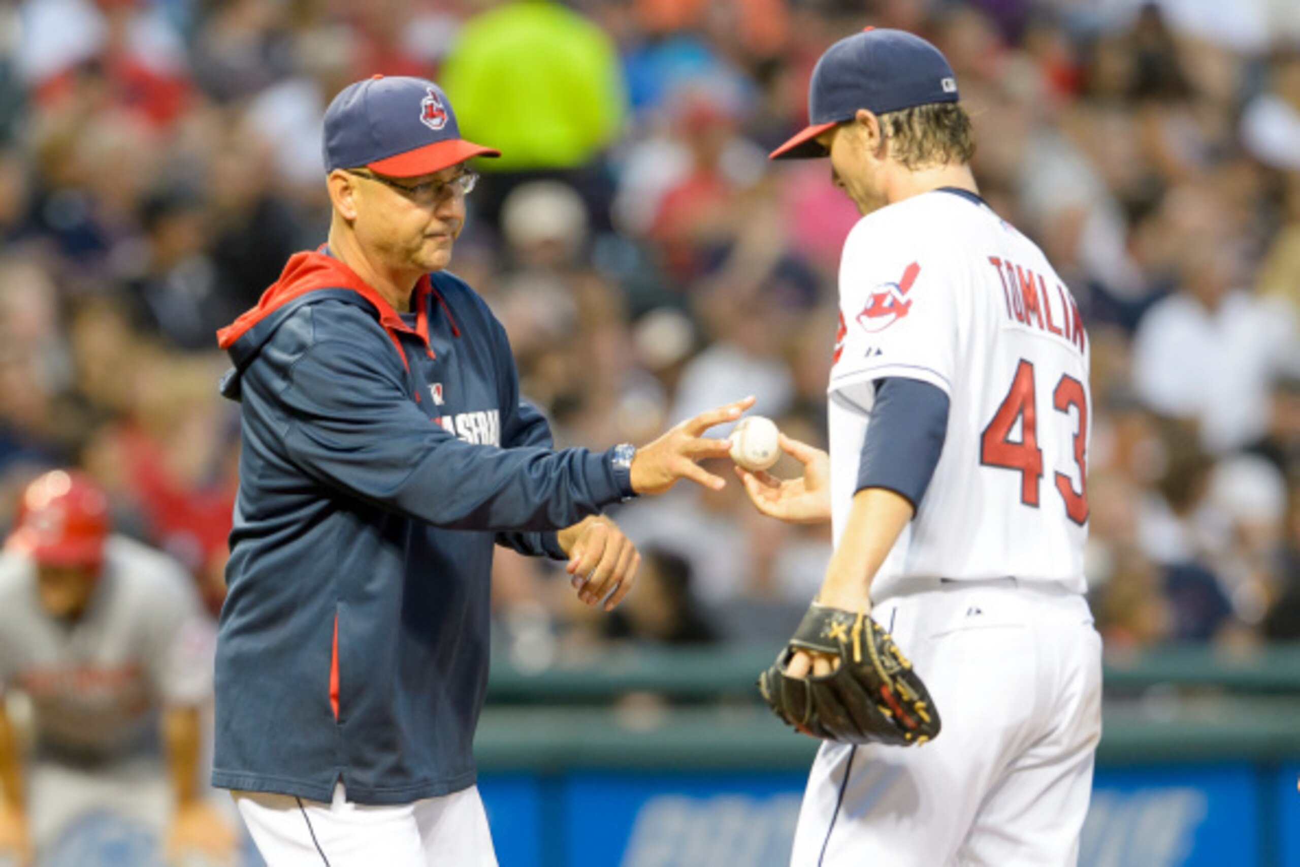 CANTON, OH - AUGUST 5: Manager Terry Francona #17 removes starting pitcher Josh Tomlin #43 of the Cleveland Indians from the game in the fifth inning against the Cincinnati Reds at Progressive Field on August 5, 2014 in Cleveland, Ohio. (Photo by Jason Mi