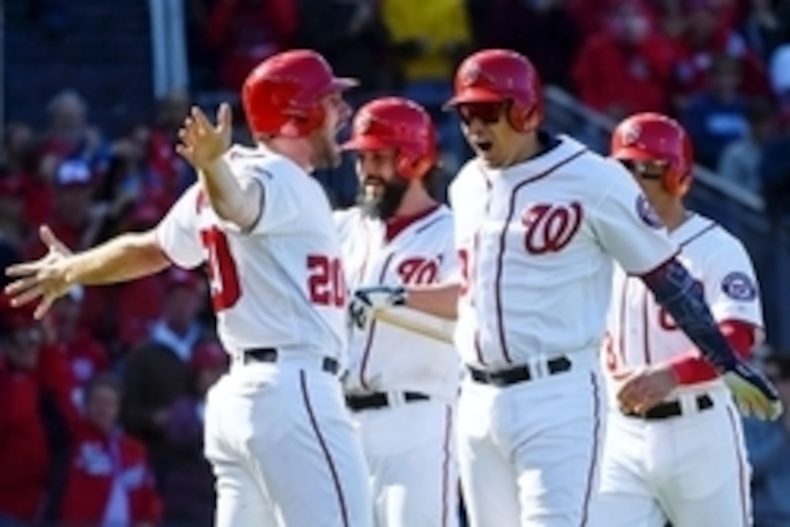 Oct 9, 2016; Washington, DC, USA; Washington Nationals catcher Jose Lobaton (59) celebrates with second baseman Daniel Murphy (20) after hitting a three run home run against the Los Angeles Dodgers during the fourth inning during game two of the 2016 NLDS