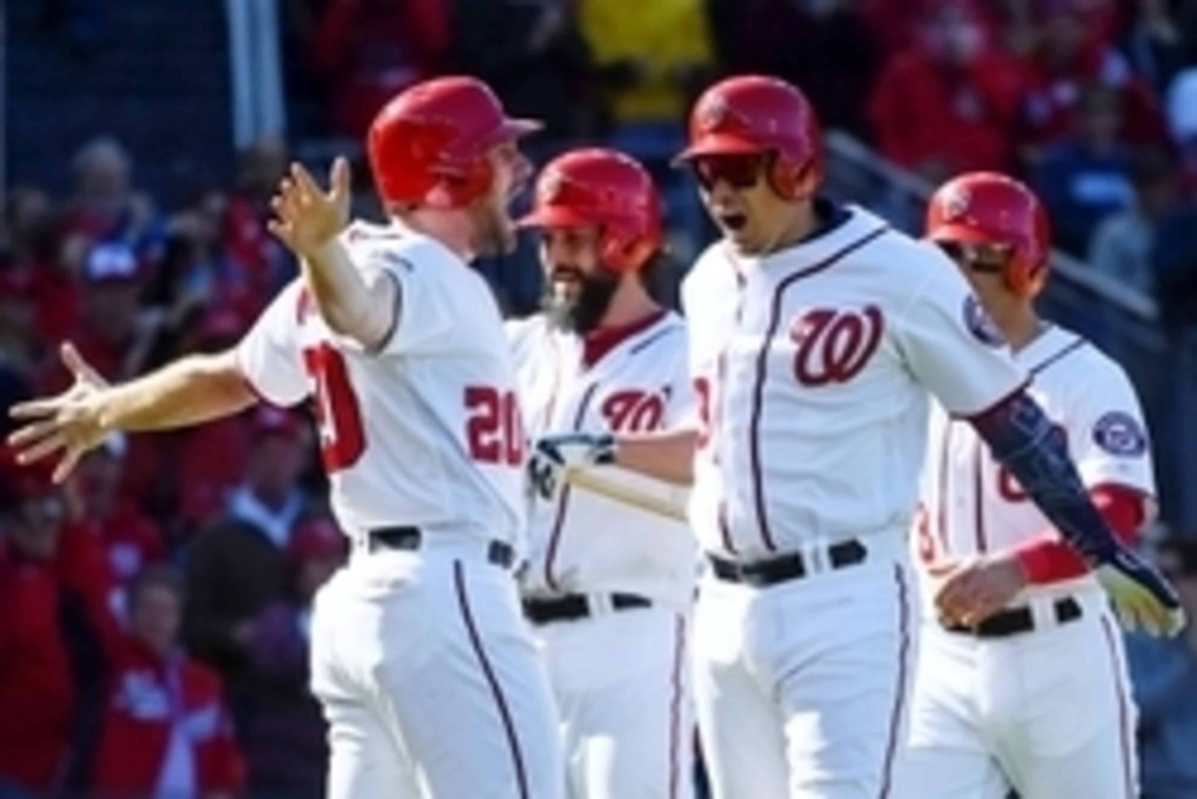 Oct 9, 2016; Washington, DC, USA; Washington Nationals catcher Jose Lobaton (59) celebrates with second baseman Daniel Murphy (20) after hitting a three run home run against the Los Angeles Dodgers during the fourth inning during game two of the 2016 NLDS