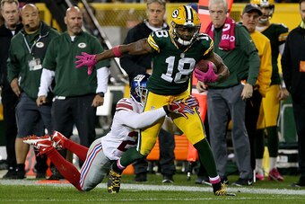 GREEN BAY, WI - OCTOBER 09:  Leon Hall #25 of the New York Giants tackles Randall Cobb #18 of the Green Bay Packers in the first quarter at Lambeau Field on October 9, 2016 in Green Bay, Wisconsin. (Photo by Dylan Buell/Getty Images)