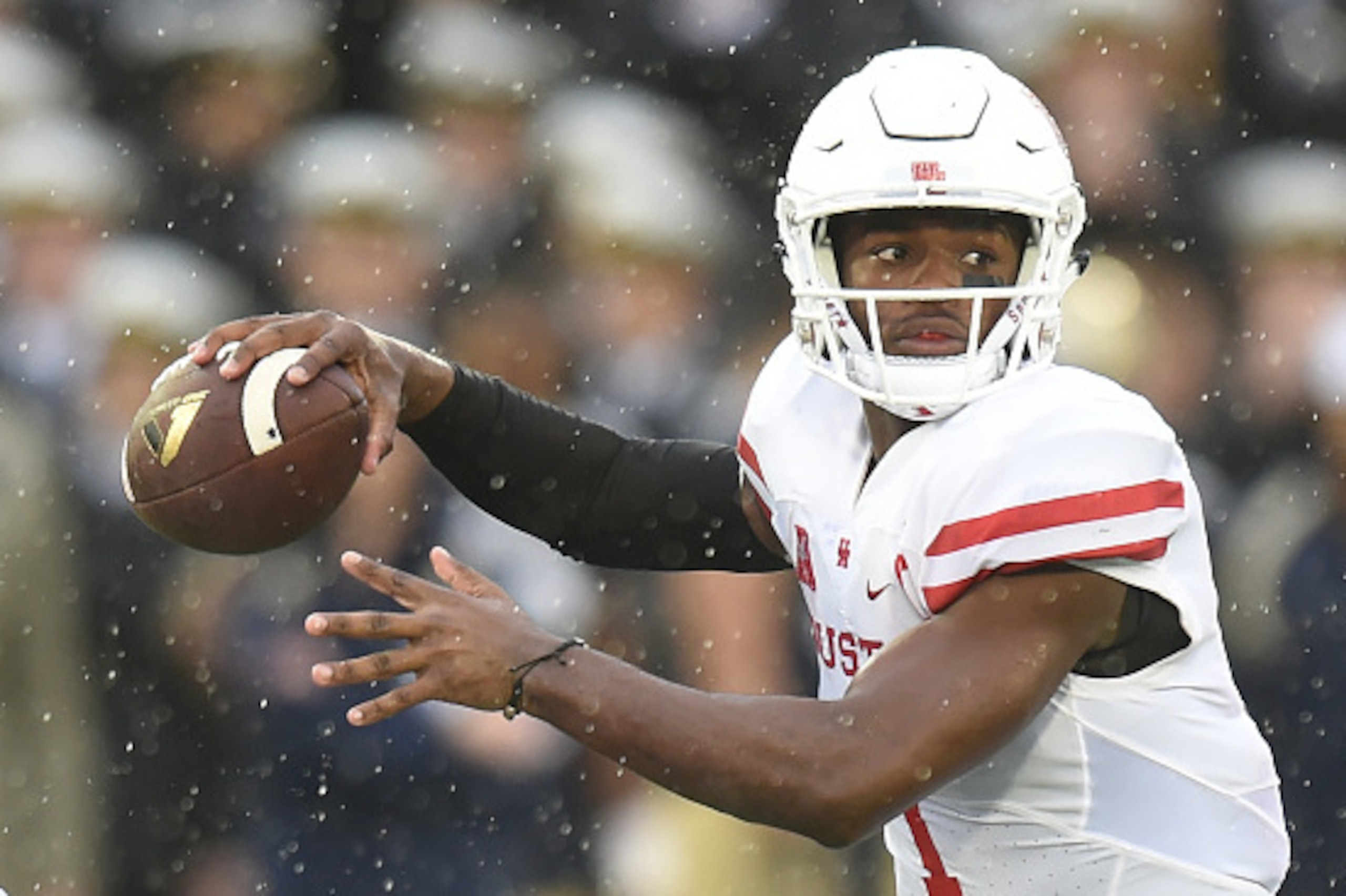 ANNAPOLIS, MD - OCTOBER 08:  Greg Ward Jr. #1 of the Houston Cougars looks to pass the ball in second quarter during  a football game against the Navy Midshipmen at Navy-Marines Memorial Stadium on October 8, 2016 in Annapolis, Maryland.  (Photo by Mitche