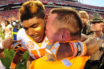 ATHENS, GA - OCTOBER 1: Jauan Jennings #15 and Coach Butch Jones of the Tennessee Volunteers celebrate after the game against the Georgia Bulldogs at Sanford Stadium on October 1, 2016 in Athens, Georgia. (Photo by Scott Cunningham/Getty Images)