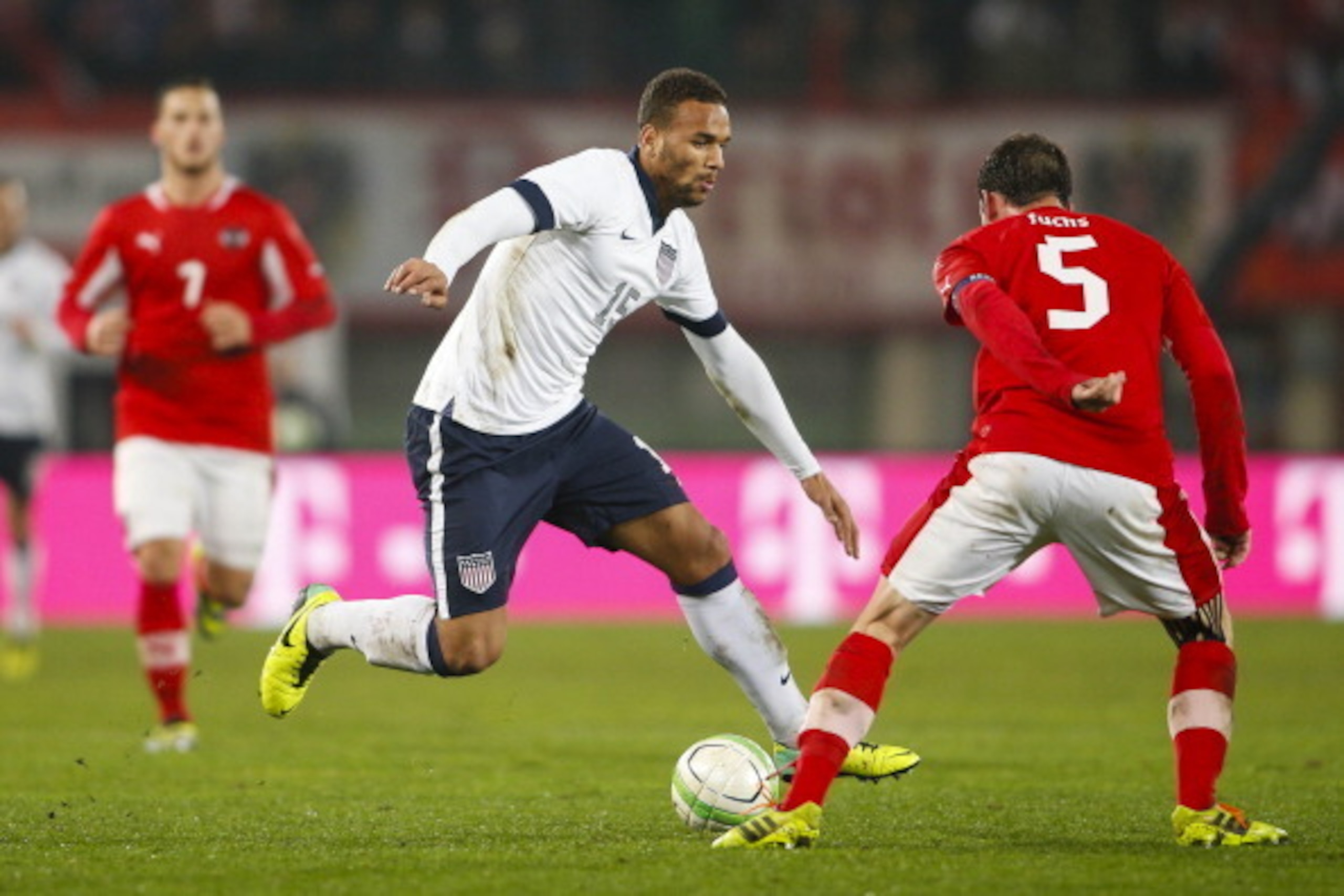 VIENNA, AUSTRIA - NOVEMBER 19:  Terrence Boyd of USA competes for the ball with Christian Fuchs (R) of Austria during the International friendly match between Austria and USA at the Ernst-Happel Stadium on November 19, 2013 in Vienna, Austria.  (Photo by