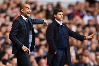 LONDON, ENGLAND - OCTOBER 02:  Josep Guardiola, Manager of Manchester City reacts next to Mauricio Pochettino, manager of Tottenham Hotspur during the Premier League match between Tottenham Hotspur and Manchester City at White Hart Lane on October 2, 2016