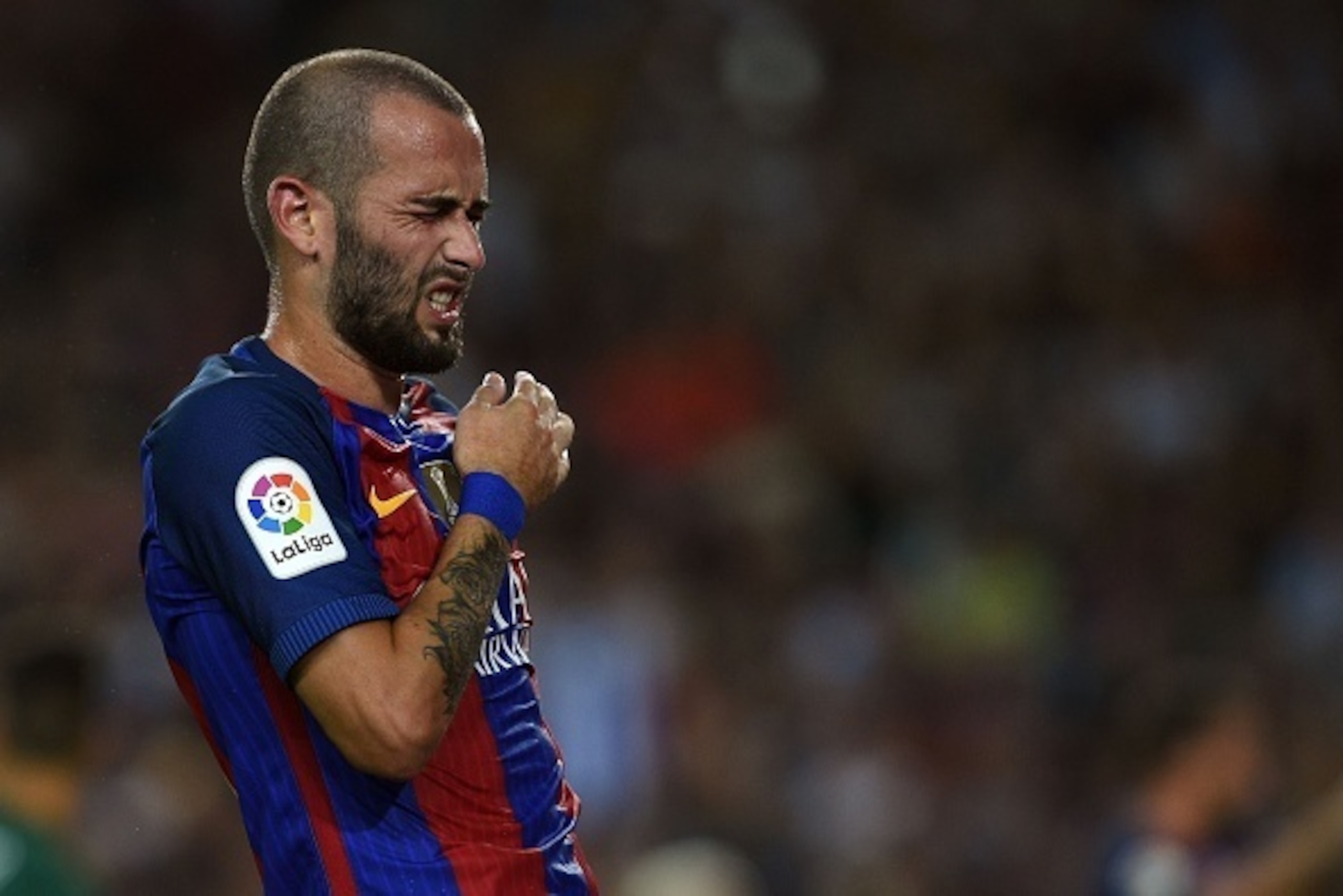 Barcelona's defender Aleix Vidal gestures during the Spanish league football match FC Barcelona vs Deportivo Alaves at the Camp Nou stadium in Barcelona on September 10, 2016. / AFP / LLUIS GENE (Photo credit should read LLUIS GENE/AFP/Getty Images Barcelona's defender Aleix Vidal gestures during the Spanish league football match FC Barcelona vs Deportivo Alaves at the Camp Nou stadium in Barcelona on September 10, 2016. / AFP / LLUIS GENE (Photo credit should read LLUIS GENE/AFP/Getty Images