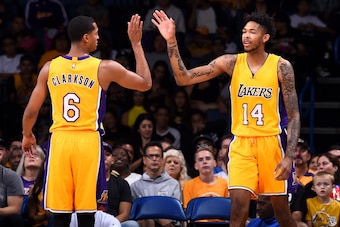 Ontario, CA - OCTOBER 9:  Brandon Ingram #14 and Jordan Clarkson #6 of the Los Angeles Lakers high-five against the Denver Nuggets during a preseason game on October 9, 2016 at Citizens Business Bank Arena in Ontario, California. NOTE TO USER: User expres