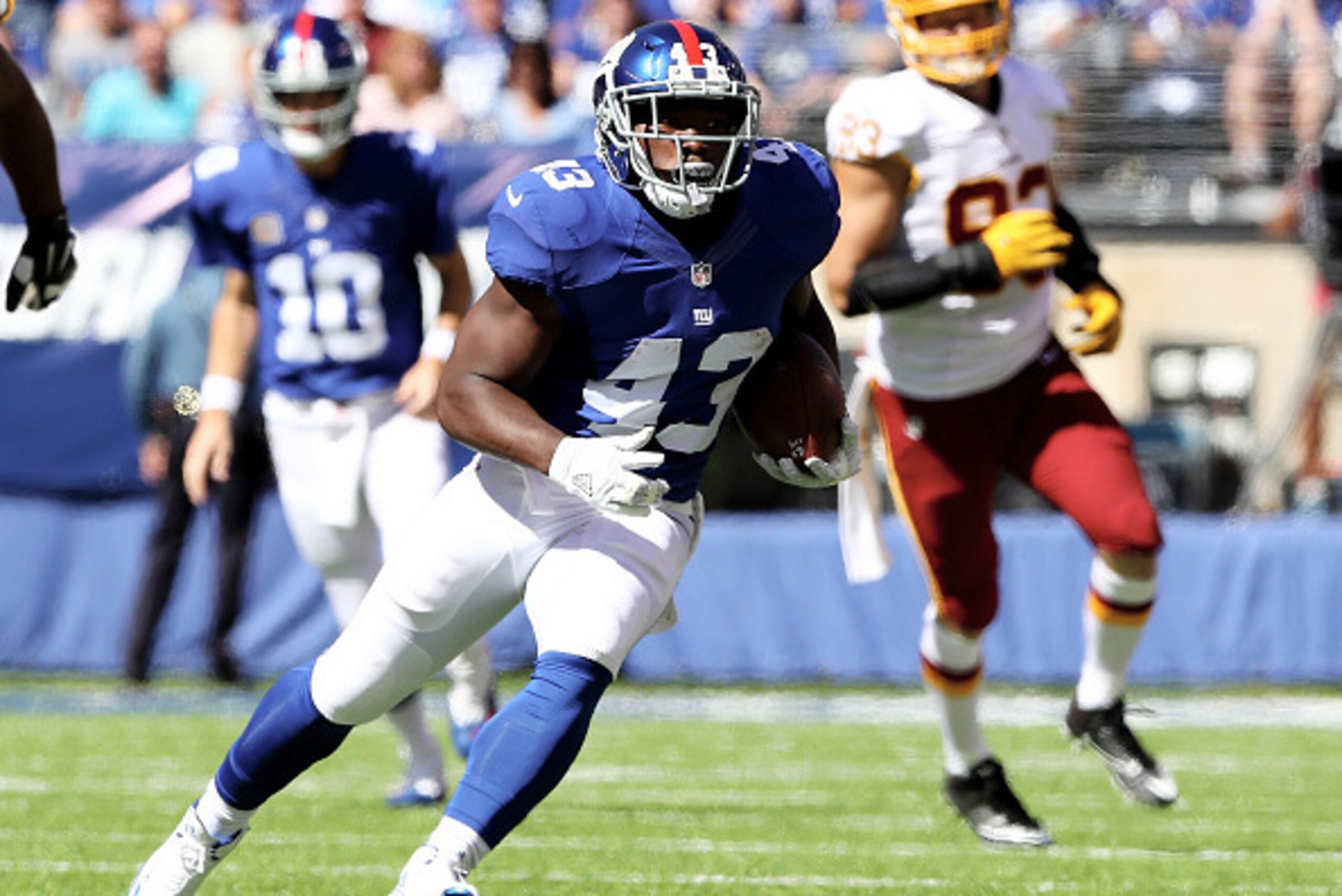 EAST RUTHERFORD, NJ - SEPTEMBER 25:   Bobby Rainey #43 of the New York Giants carries the ball in the first quarter against the Washington Redskins at MetLife Stadium on September 25, 2016 in East Rutherford, New Jersey.  (Photo by Elsa/Getty Images)