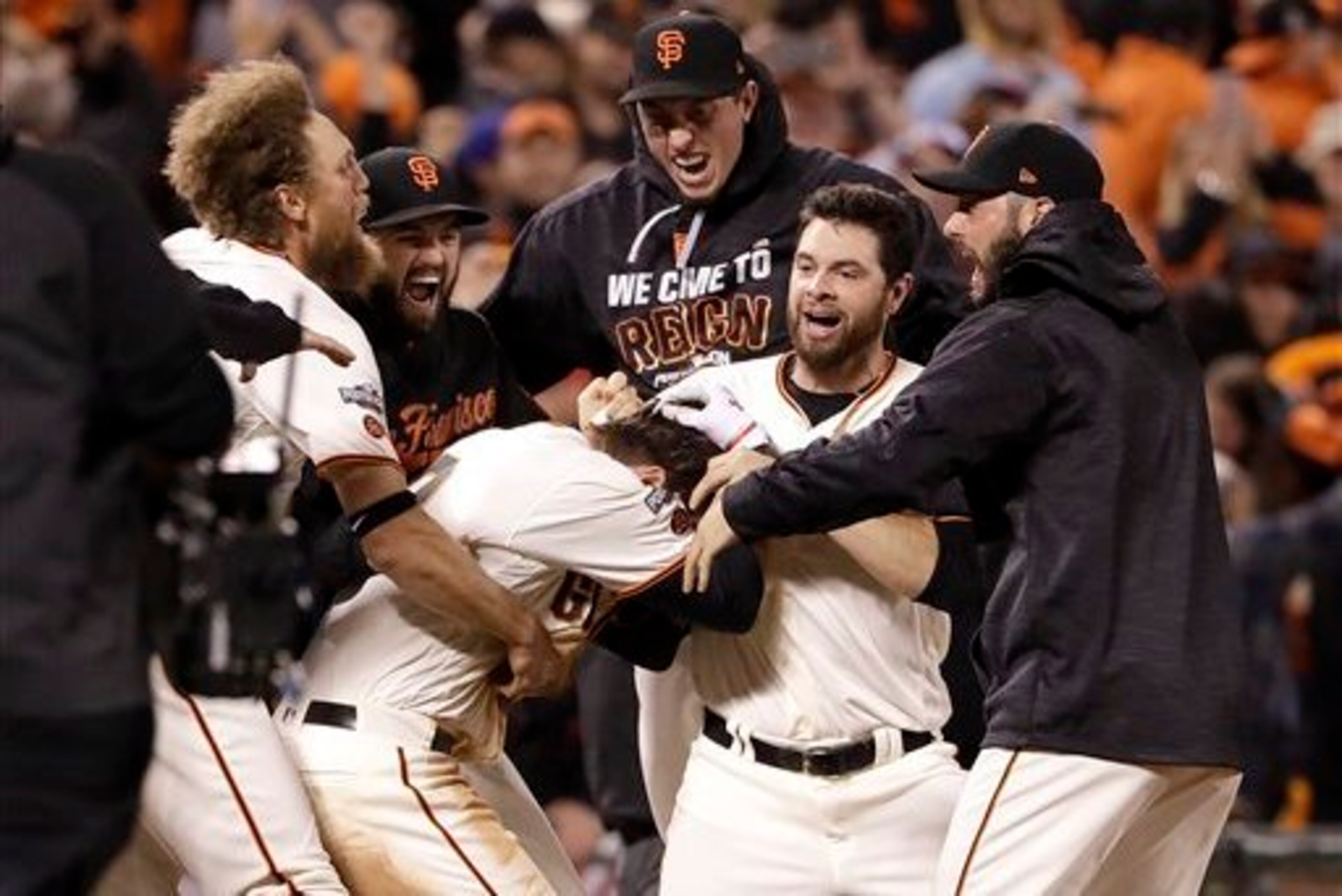 The Giants celebrate their Game 3 victory over the Cubs in the NLDS.