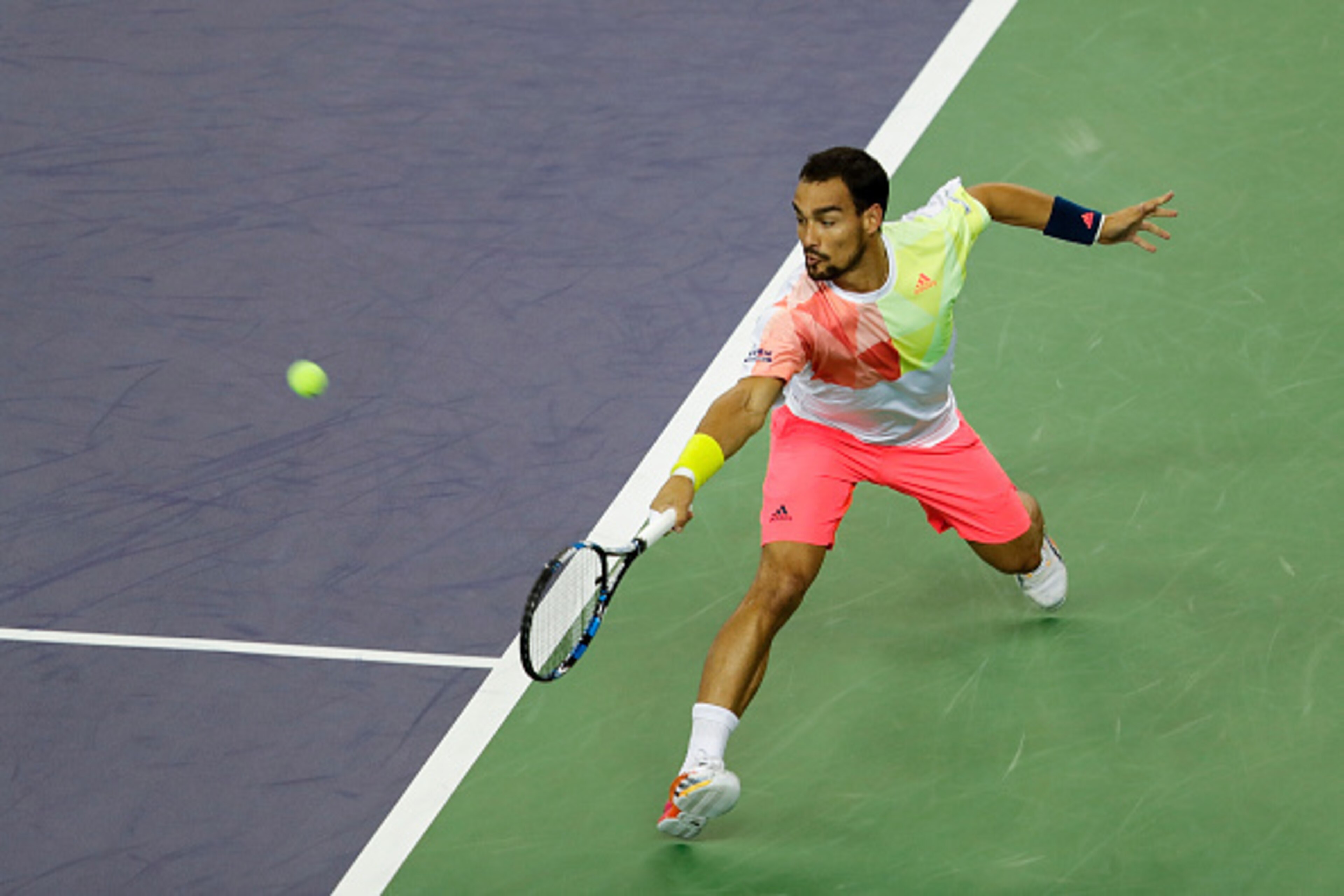 SHANGHAI, CHINA - OCTOBER 11:  Fabio Fognini of Italy returns a shot against Novak Djokovic of Serbia during the Men's singles first round match on day three of Shanghai Rolex Masters at Qi Zhong Tennis Centre on October 11, 2016 in Shanghai, China.  (Pho