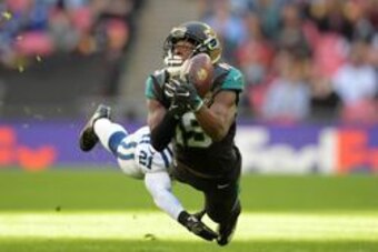 Oct 2, 2016; London, United Kingdom; Jacksonville Jaguars wide receiver Allen Robinson (15) is defended by Indianapolis Colts cornerback Vontae Davis (21) in the third quarter at Wembley Stadium. The Jaguars defeated the Colts 30-27. Mandatory Credit: Kir