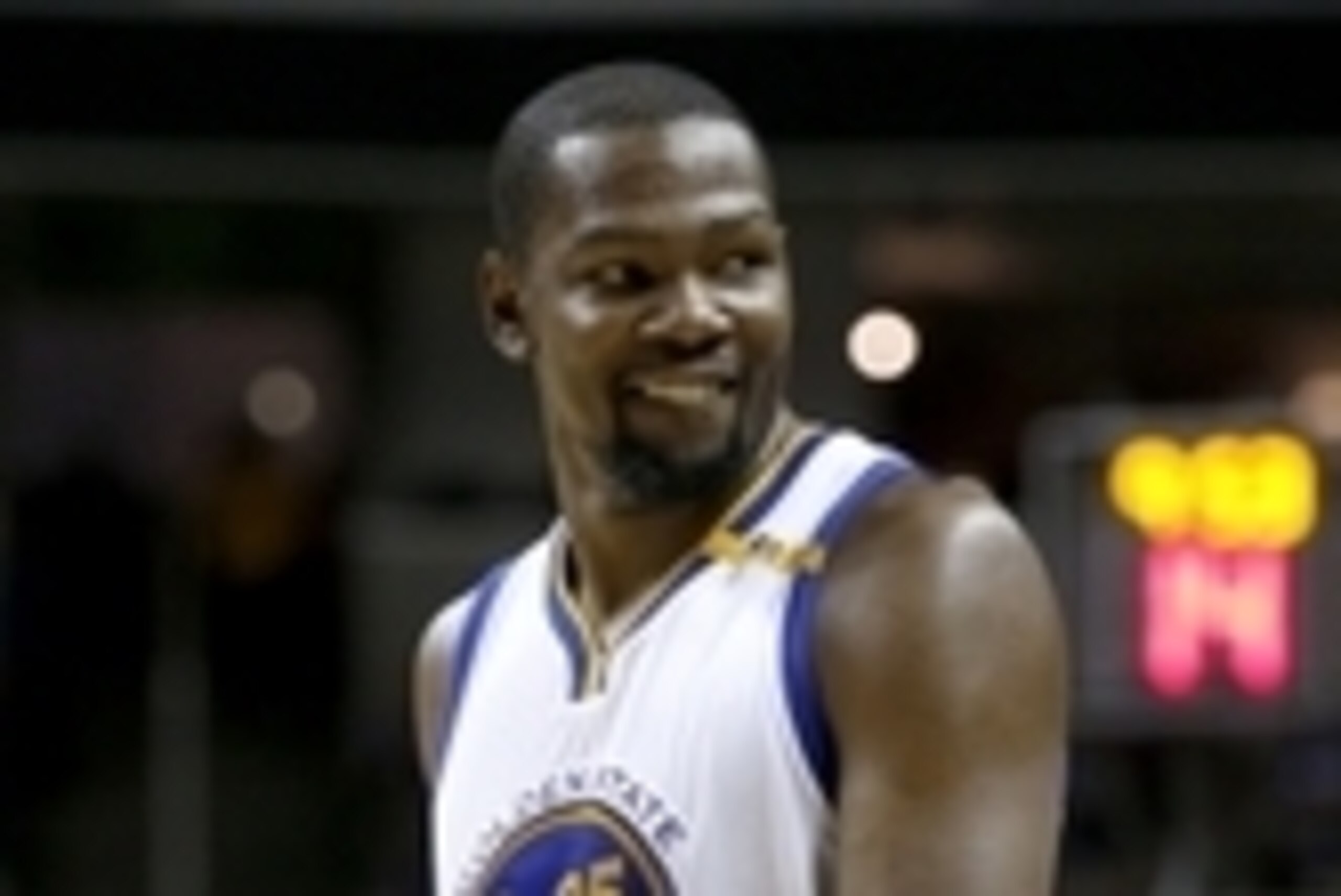Oct 6, 2016; San Jose, CA, USA; Golden State Warriors forward Kevin Durant (35) smiles towards the crowd during action against the Sacramento Kings in the third quarter at the SAP Center. Mandatory Credit: Cary Edmondson-USA TODAY Sports