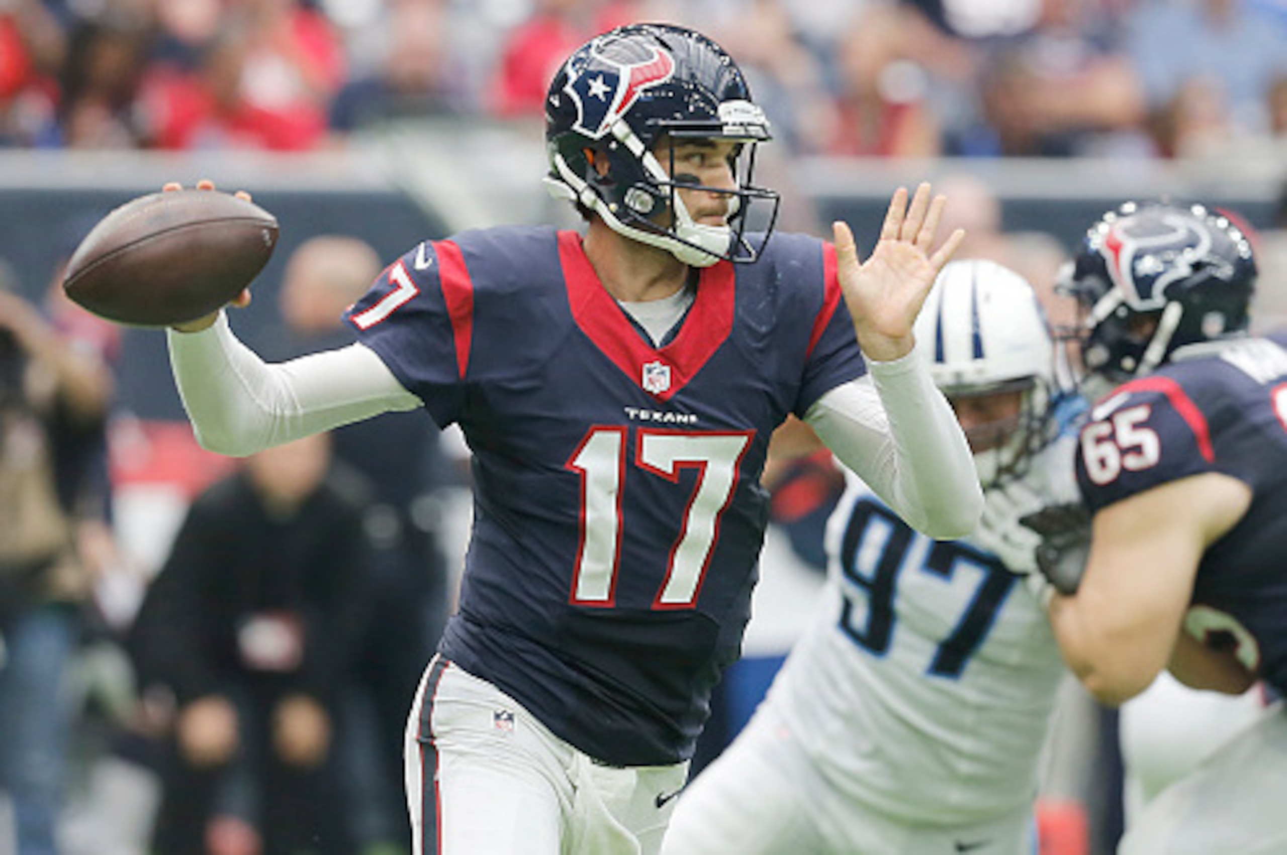 HOUSTON, TX - OCTOBER 2: Brock Osweiler #17 of the Houston Texans scrambles against the Tennessee Titans at NRG Stadium on October 2, 2016 in Houston, Texas.  Texans won 27 to 20. (Photo by Thomas B. Shea/Getty Images)