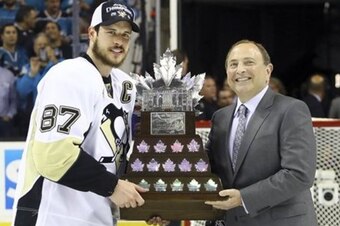 Crosby accepting the Conn Smythe Trophy as the NHL's 2016 playoff MVP.