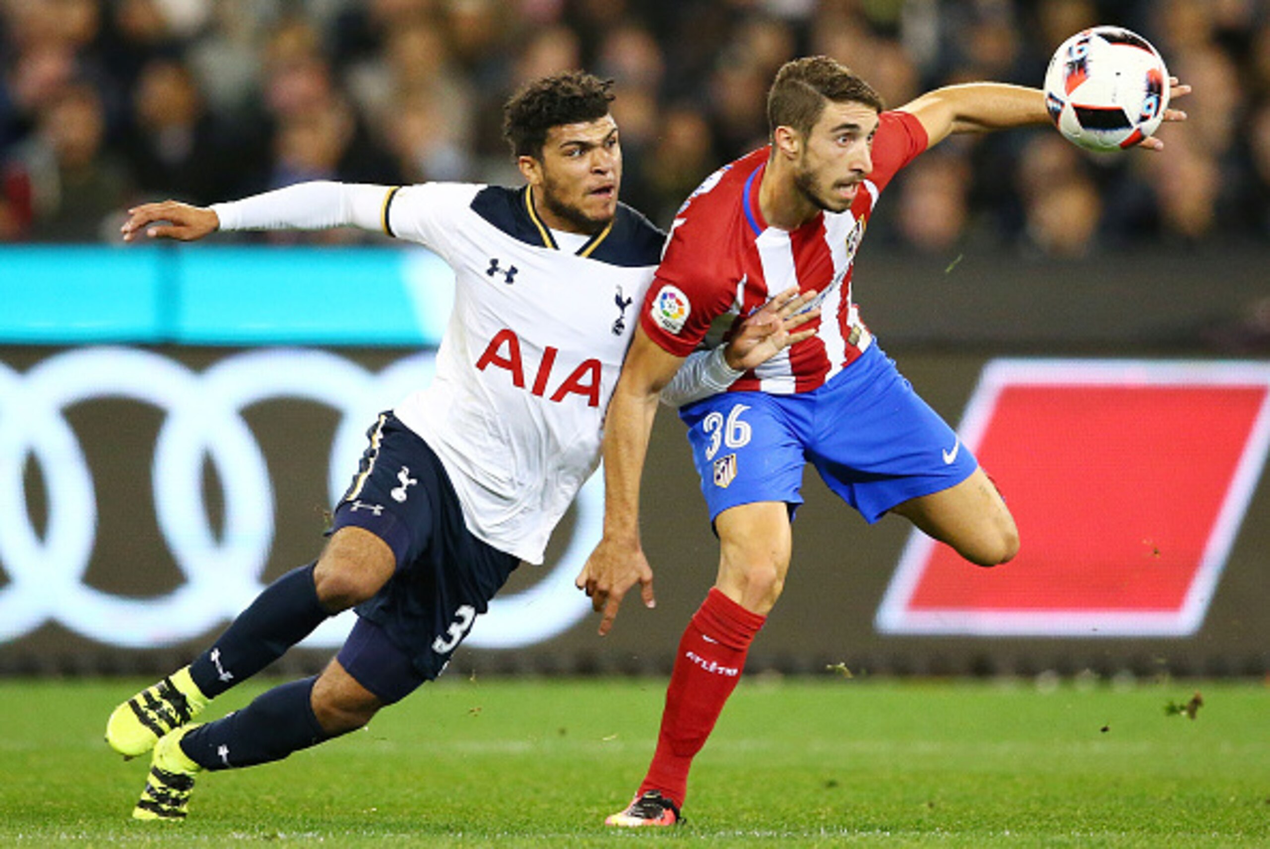 MELBOURNE, AUSTRALIA - JULY 29:  DeAndre Yedlin of Tottenham Hotspur and Sime Vrsaljko of Atletico de Madrid compete for the ball during 2016 International Champions Cup Australia match between Tottenham Hotspur and Atletico de Madrid at the Melbourne Cri