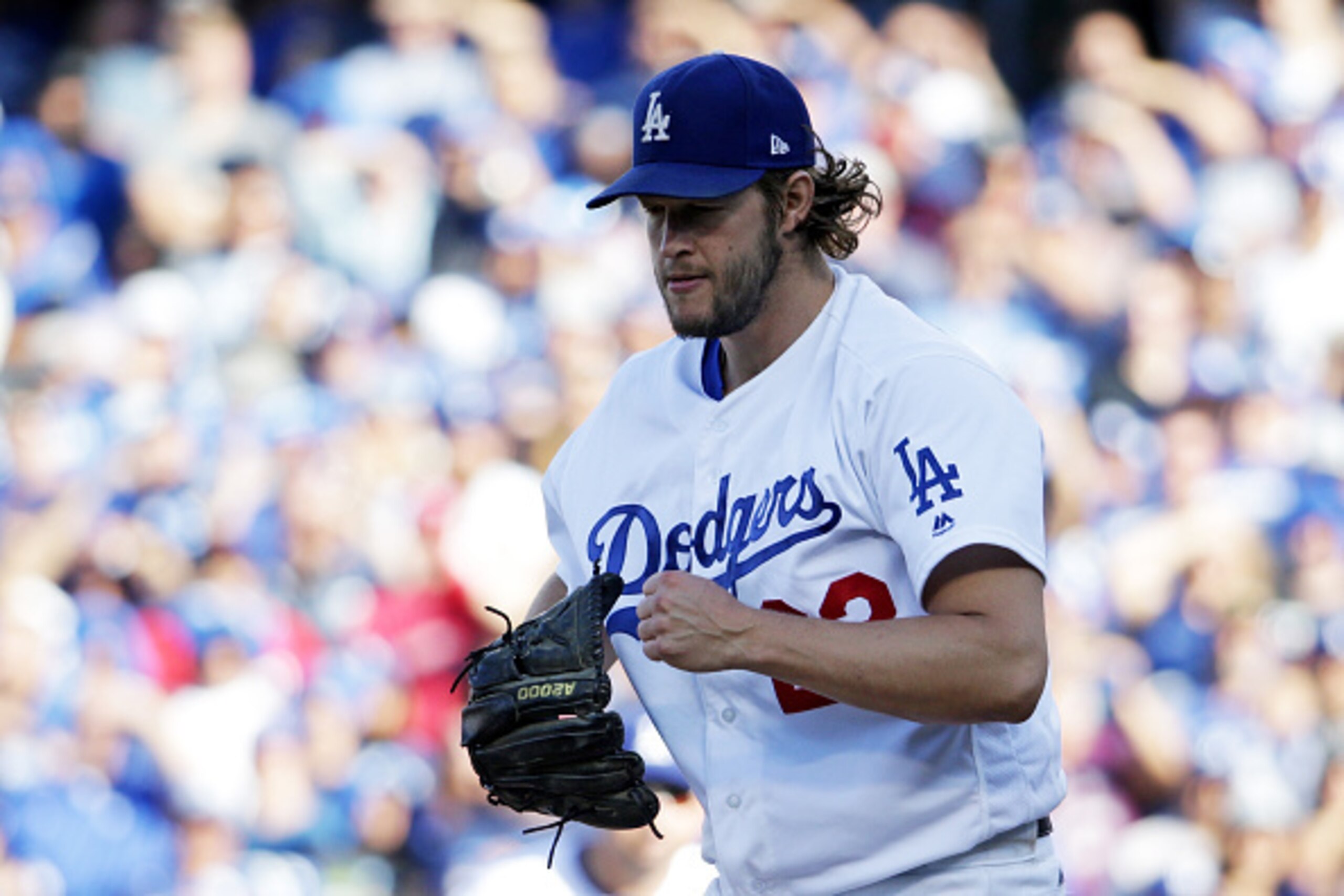 LOS ANGELES, CA - OCTOBER 11:  Clayton Kershaw #22 of the Los Angeles Dodgers reacts after striking out Ryan Zimmerman #11 of the Washington Nationals in the sixth inning during game four of the National League Division Series at Dodger Stadium on October