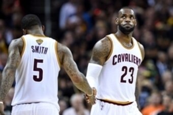 Jun 16, 2016; Cleveland, OH, USA; Cleveland Cavaliers forward LeBron James (23) reacts during the fourth quarter with guard J.R. Smith (5) against the Golden State Warriors in game six of the NBA Finals at Quicken Loans Arena. Mandatory Credit: Bob Donnan