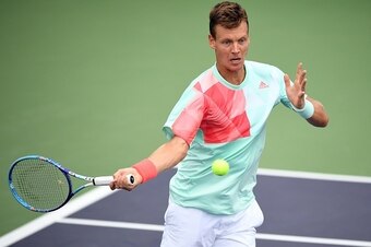 Tomas Berdych of Czech Republic hits a return against Marcel Granollers of Spain during their men's singles match at the Shanghai Masters tennis tournament in Shanghai on October 12, 2016. / AFP / JOHANNES EISELE        (Photo credit should read JOHANNES 