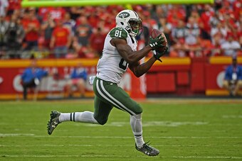 KANSAS CITY, MO - SEPTEMBER 25:  Wide receiver Quincy Enunwa #81 of the New York Jets catches a pass against the Kansas City Chiefs during the second half on September 25, 2016 at Arrowhead Stadium in Kansas City, Missouri.  (Photo by Peter G. Aiken/Getty