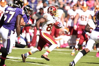 BALTIMORE, MD - OCTOBER 09:  Jamison Crowder #80 of the Washington Redskins returns a punt for a touchdown in the first quarter during a football game against the Baltimore Ravens at M&T Bank Stadium on October 9, 2016 in Baltimore, Maryland.  (Photo by M