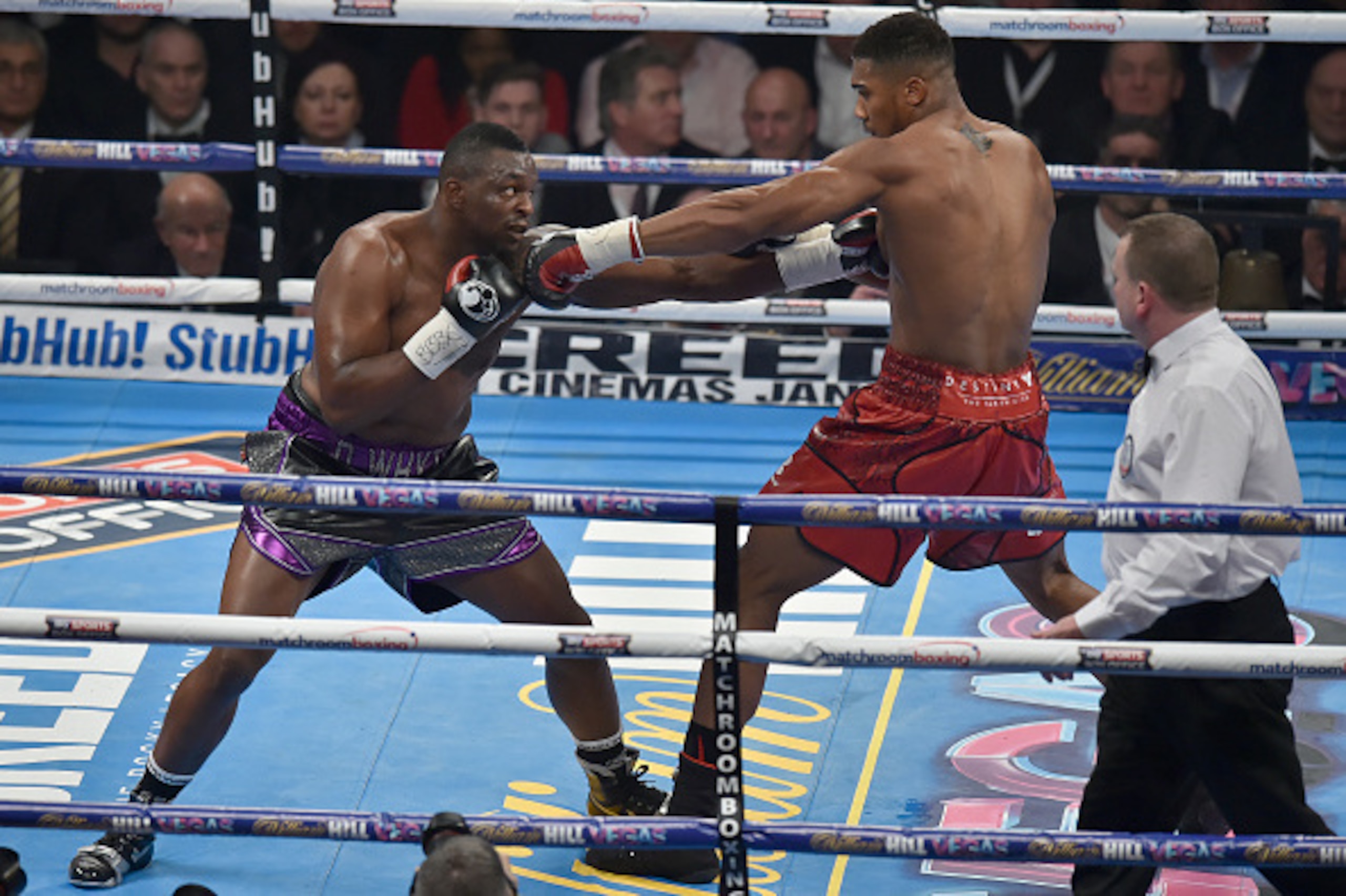 LONDON, ENGLAND - DECEMBER 12:  Dillian Whyte (L) boxing Anthony Joshua MBE  for the Commonwealth Heavyweight title, Vacant British Heavyweight title and WBC International Heavyweight title at The O2 Arena on December 12, 2015 in London, England.  (Photo 
