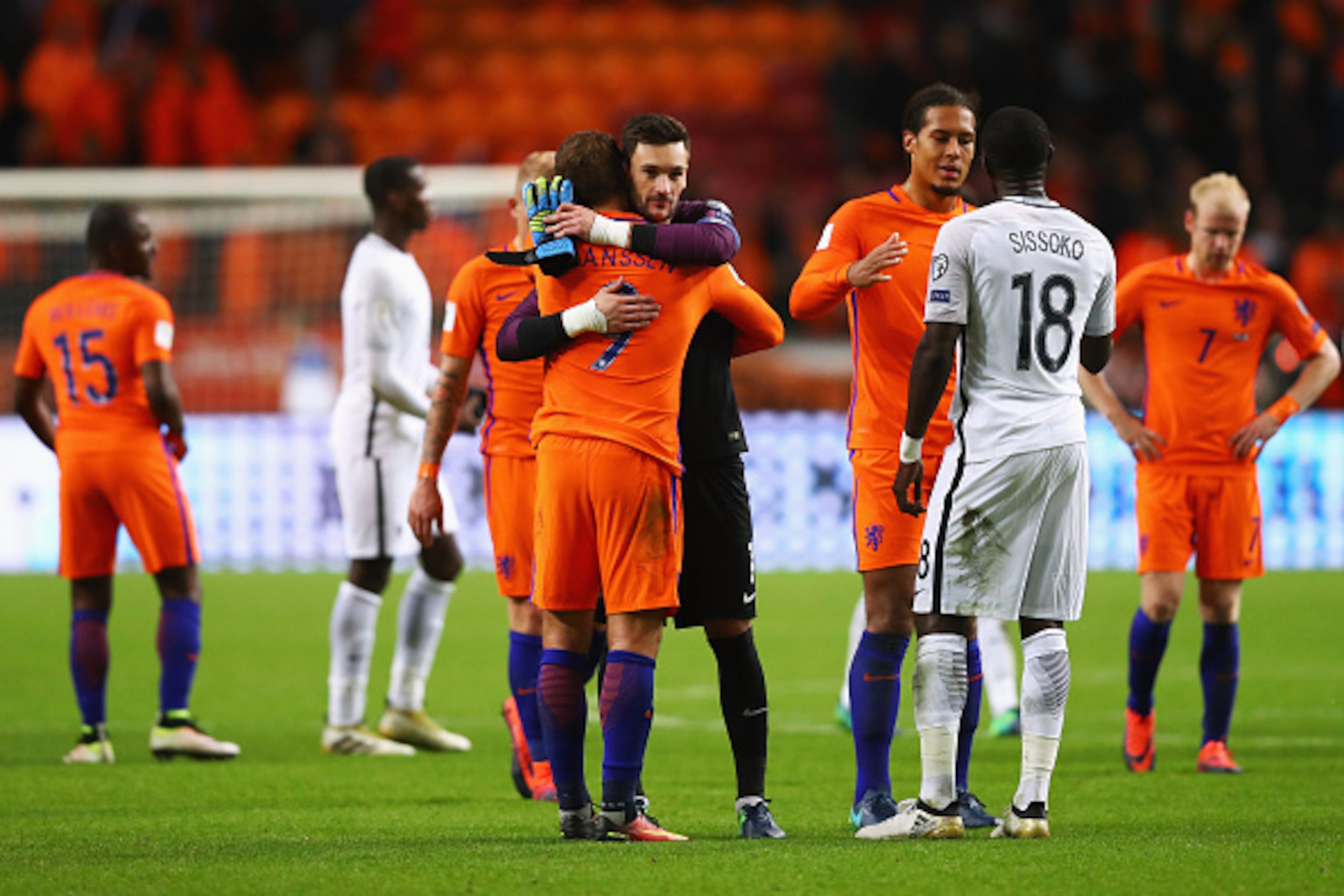 AMSTERDAM, NETHERLANDS - OCTOBER 10:  Tottenham Hotspur players Hugo Lloris of France and Vincent Janssen of the Netherlands embrace after the FIFA 2018 World Cup Qualifier between Netherlands and France held at Amsterdam Arena on October 10, 2016 in Amst
