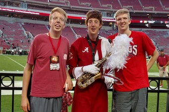 Connor (right) with his brothers Brandon (left) and Justin.