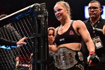 Aug 1, 2015; Rio de Janeiro, RJ, Brazil; Ronda Rousey (red gloves) celebrates after defeating Bethe Correia (not pictured) during UFC 190 at HSBC Arena. Mandatory Credit: Jason Silva-USA TODAY Sports