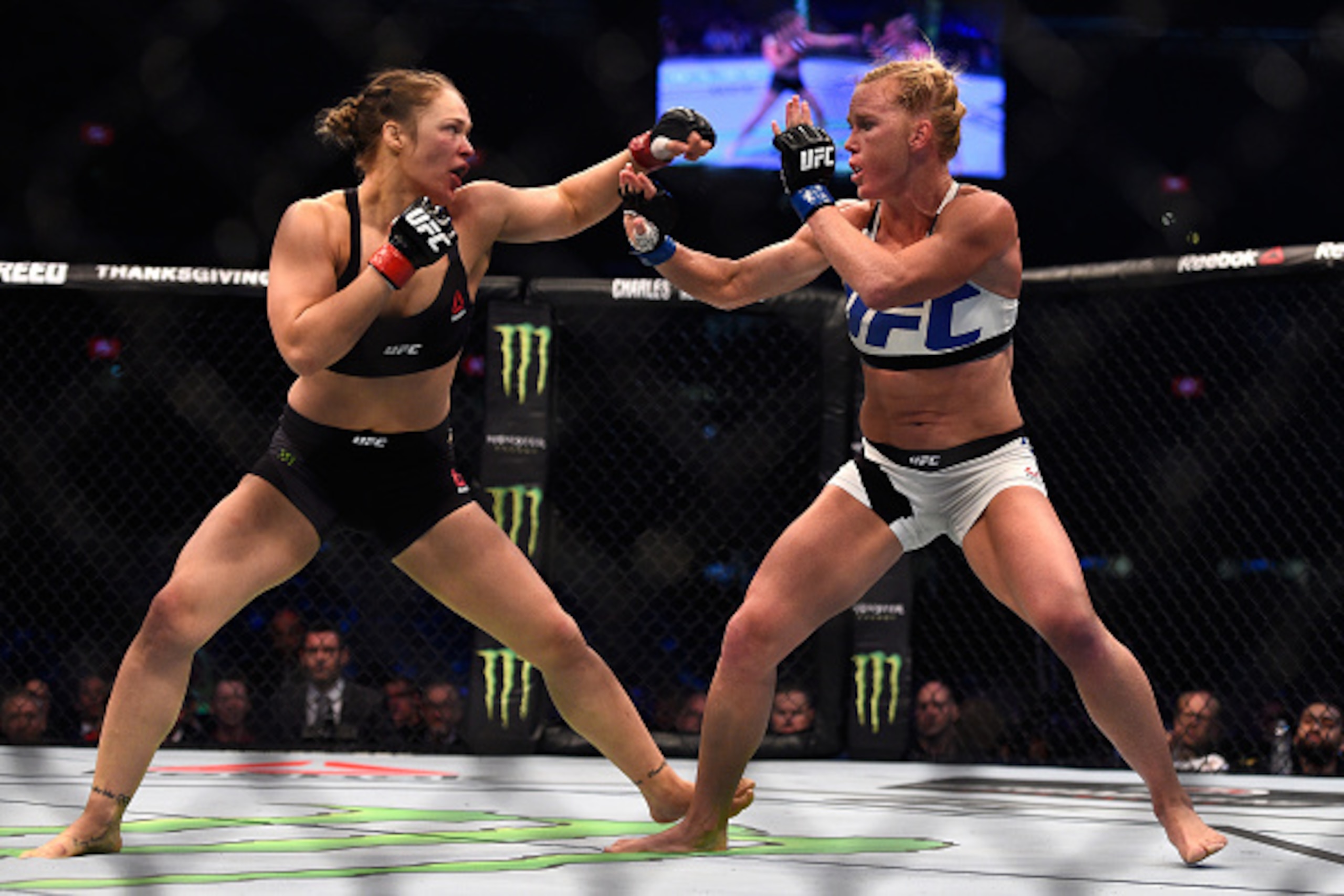 MELBOURNE, AUSTRALIA - NOVEMBER 15: (L-R) Ronda Rousey faces Holly Holm in their UFC women's bantamweight championship bout during the UFC 193 event at Etihad Stadium on November 15, 2015 in Melbourne, Australia. (Photo by Jeff Bottari/Zuffa LLC/Zuffa LL MELBOURNE, AUSTRALIA - NOVEMBER 15: (L-R) Ronda Rousey faces Holly Holm in their UFC women's bantamweight championship bout during the UFC 193 event at Etihad Stadium on November 15, 2015 in Melbourne, Australia. (Photo by Jeff Bottari/Zuffa LLC/Zuffa LL