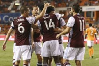 Oct 8, 2016; Houston, TX, USA; Colorado Rapids forward Dominique Badji (14) celebrates with teammates after scoring a goal during the first half against the Houston Dynamo at BBVA Compass Stadium. Mandatory Credit: Troy Taormina-USA TODAY Sports