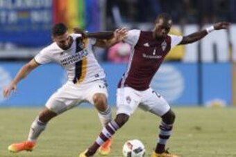 Jun 22, 2016; Carson, CA, USA; LA Galaxy midfielder Sebastian Lletget (17) and Colorado Rapids midfielder Micheal Azira (22) battle for the ball during the first half at StubHub Center. Mandatory Credit: Kelvin Kuo-USA TODAY Sports
