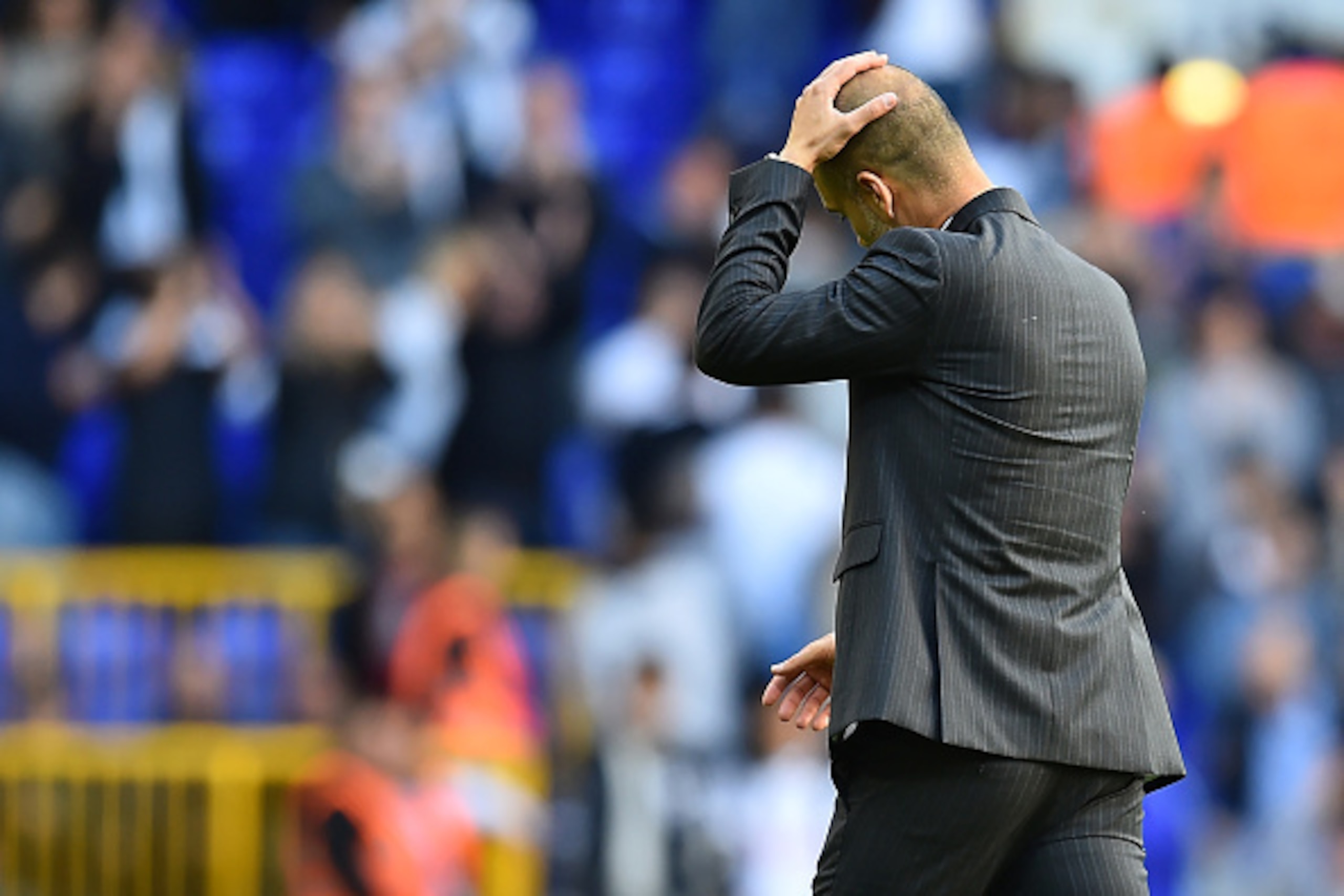 Manchester City's Spanish manager Pep Guardiola reacts after the English Premier League football match between Tottenham Hotspur and Manchester City at White Hart Lane in London, on October 2, 2016.
Tottenham won the game 2-0, Manchester City's first defe