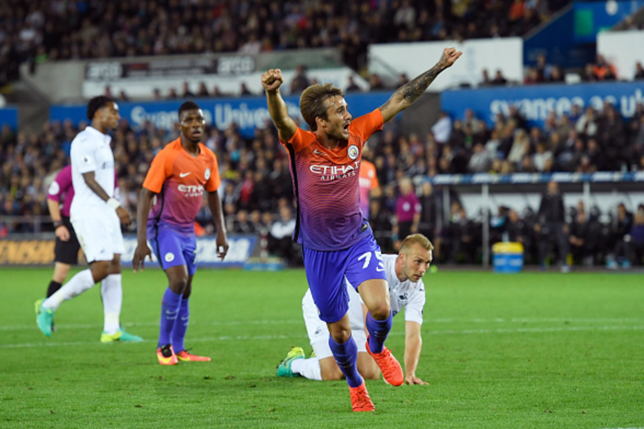 SWANSEA, WALES - SEPTEMBER 21:  Aleix Garcia Serrano of Manchester City celebrates scoing his sides second goal during the  EFL Cup Third Round match between Swansea City and Manchester City at the Liberty Stadium on September 21, 2016 in Swansea, Wales. 