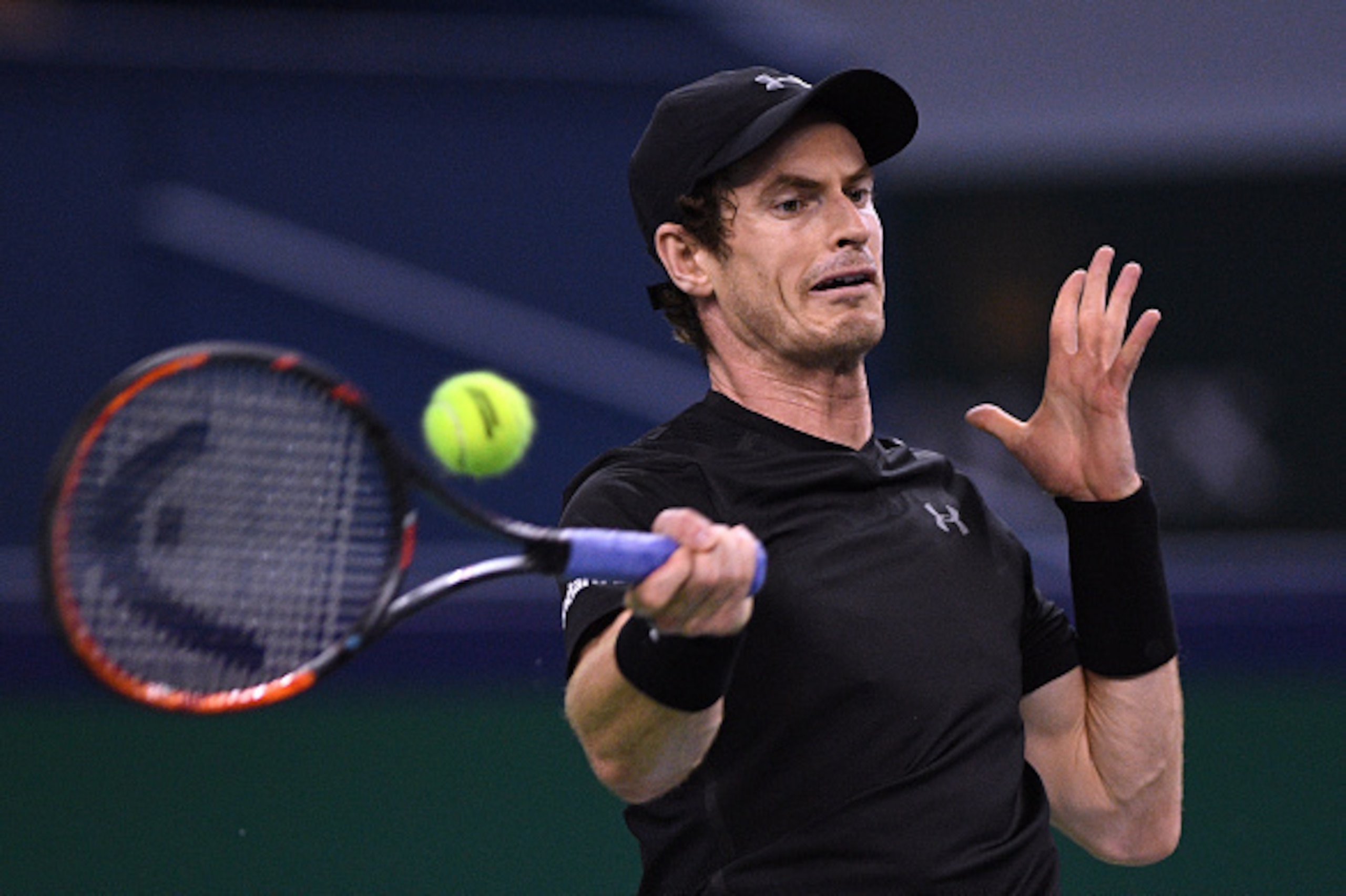 Andy Murray of Britain hits a return against Steve Johnson of the US during their men's singles match at the Shanghai Masters tennis tournament in Shanghai on October 12, 2016. / AFP / JOHANNES EISELE        (Photo credit should read JOHANNES EISELE/AFP/G