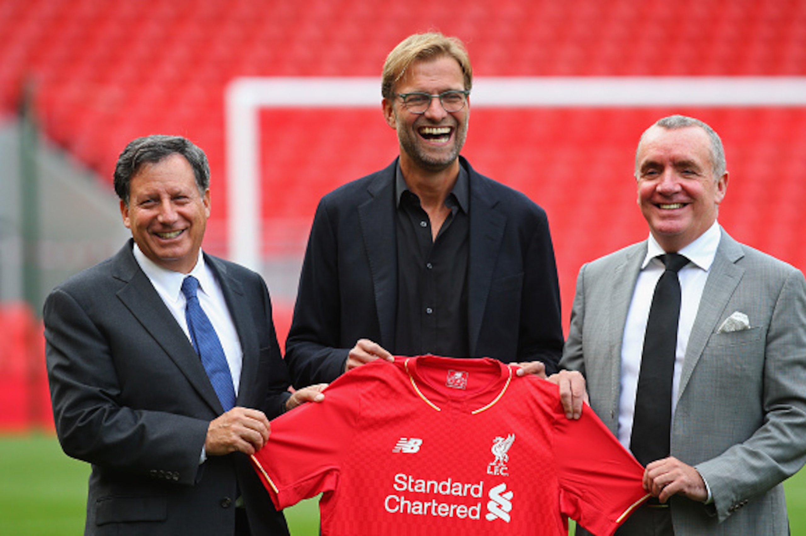LIVERPOOL, ENGLAND - OCTOBER 09:  Jurgen Klopp at Anfield is unveiled as the new manager of Liverpool FC as he stands alongside Tom Werner (l) the chairman and Ian Ayre (r) the chief executive during a photocall at Anfield on October 9, 2015 in Liverpool,
