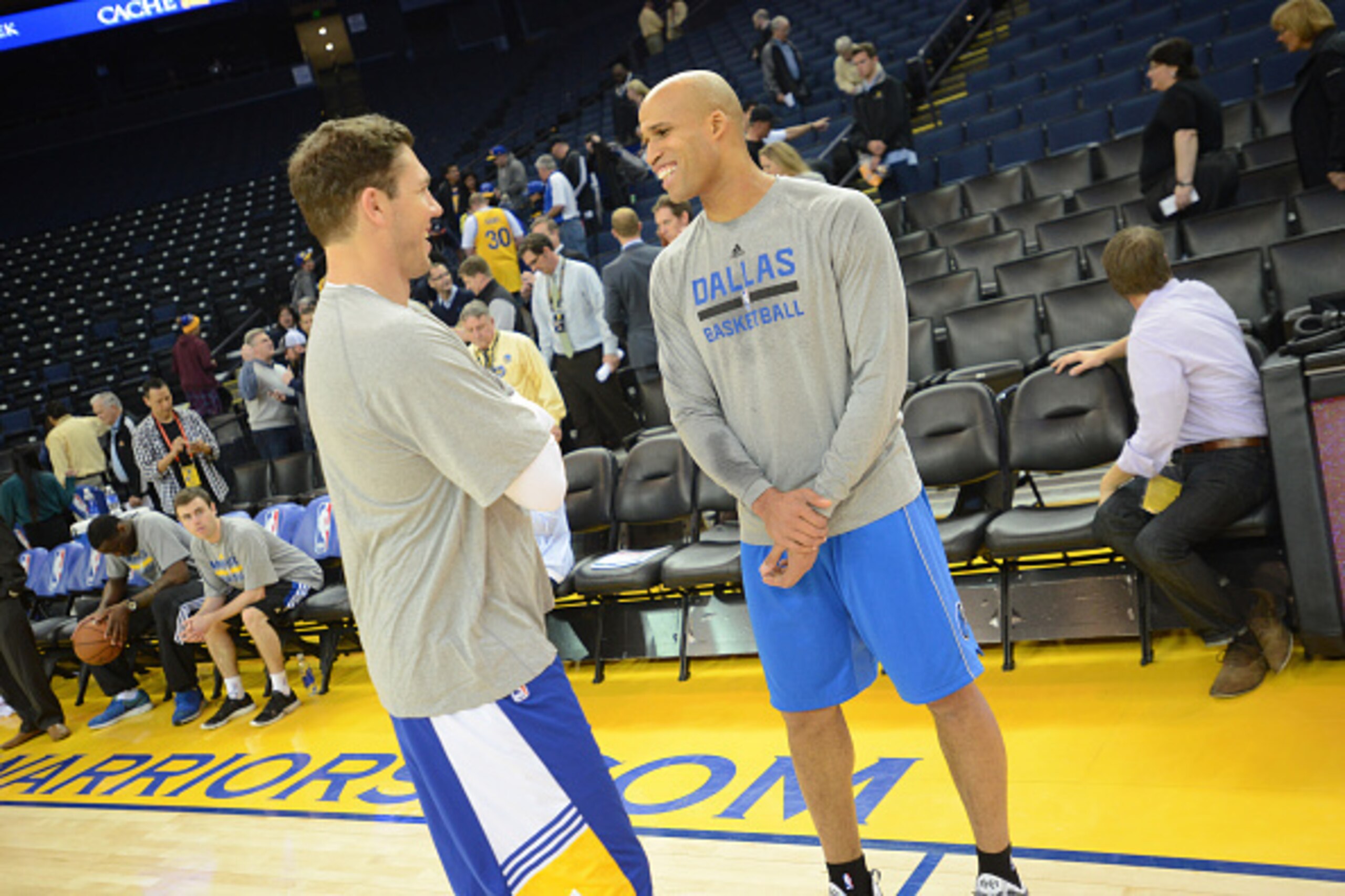 OAKLAND, CA - FEBRUARY 4: Assistant coach Luke Walton of the Golden State Warriors speaks to Richard Jefferson #24 of the Dallas Mavericks prior to the game on February 4, 2015 at Oracle Arena in Oakland, California. NOTE TO USER: User expressly acknowled