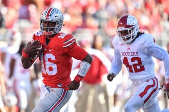 COLUMBUS, OH - OCTOBER 8:  Quarterback J.T. Barrett #16 of the Ohio State Buckeyes runs with the ball against the Indiana Hoosiers at Ohio Stadium on October 8, 2016 in Columbus, Ohio. Ohio State defeated Indiana 38-17.  (Photo by Jamie Sabau/Getty Images