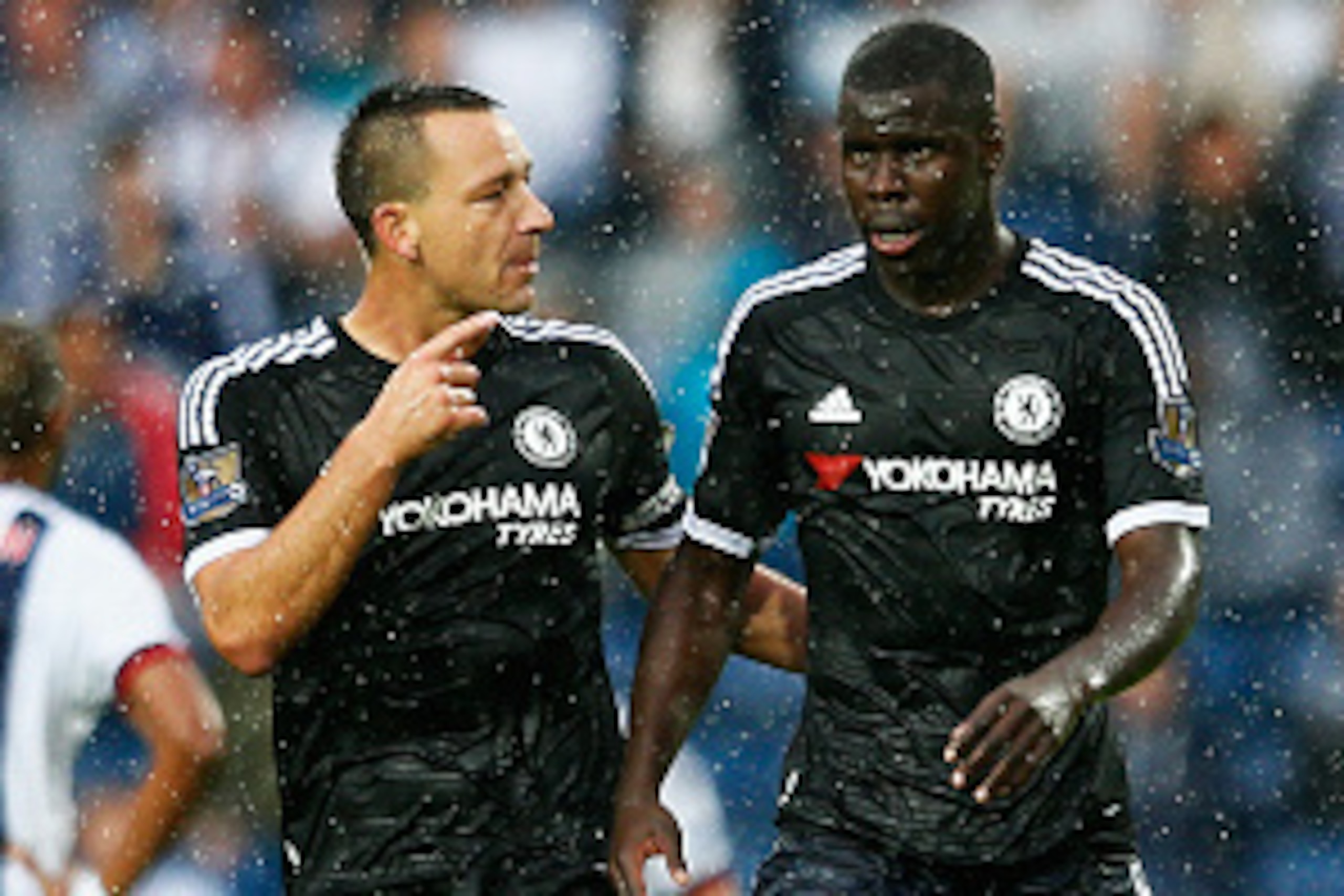 WEST BROMWICH, ENGLAND - AUGUST 23:  John Terry of Chelsea talks to Kurt Zouma of Chelsea during the Barclays Premier League match between West Bromwich Albion and Chelsea at The Hawthorns on August 23, 2015 in West Bromwich, England.  (Photo by Julian Fi