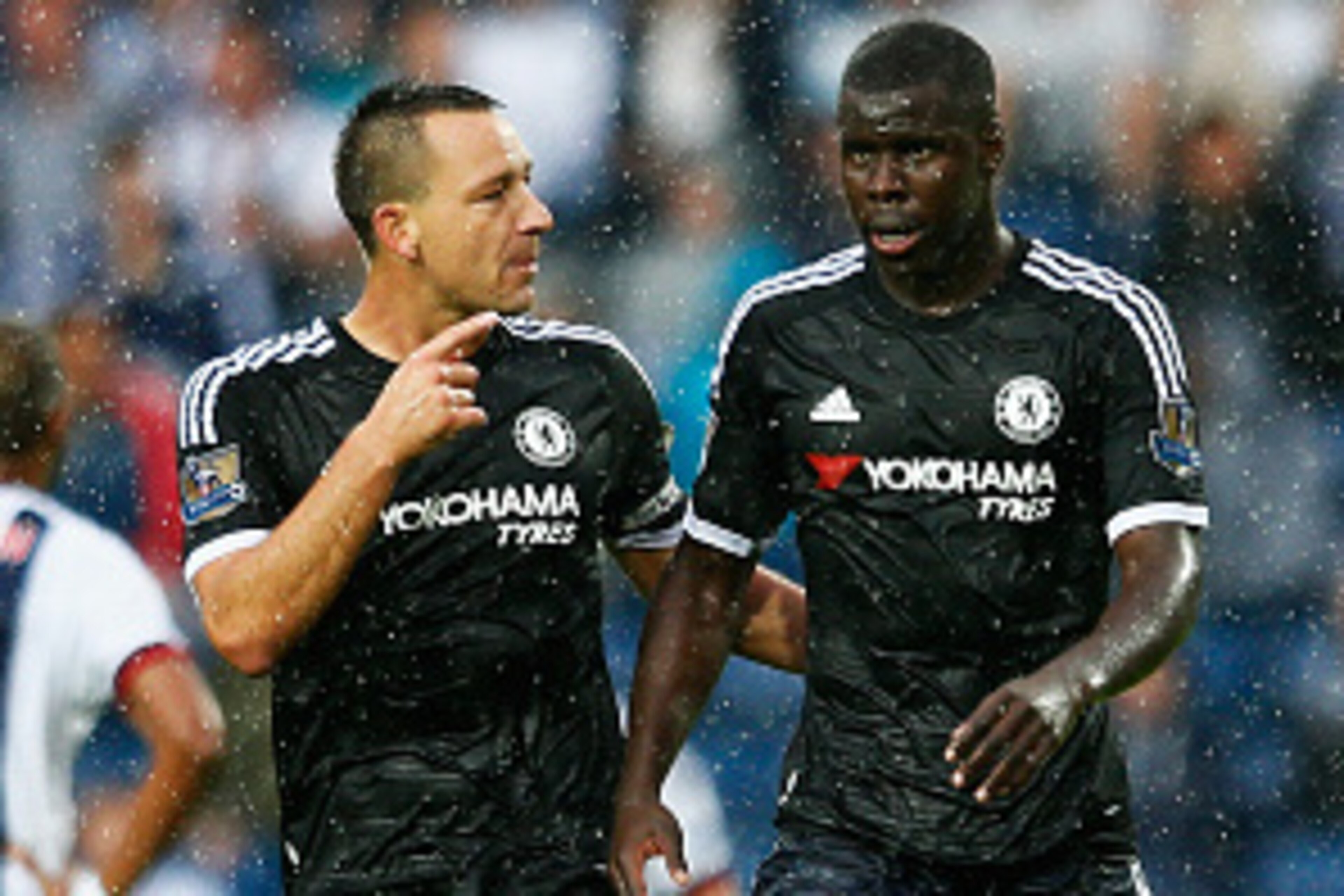 WEST BROMWICH, ENGLAND - AUGUST 23:  John Terry of Chelsea talks to Kurt Zouma of Chelsea during the Barclays Premier League match between West Bromwich Albion and Chelsea at The Hawthorns on August 23, 2015 in West Bromwich, England.  (Photo by Julian Fi