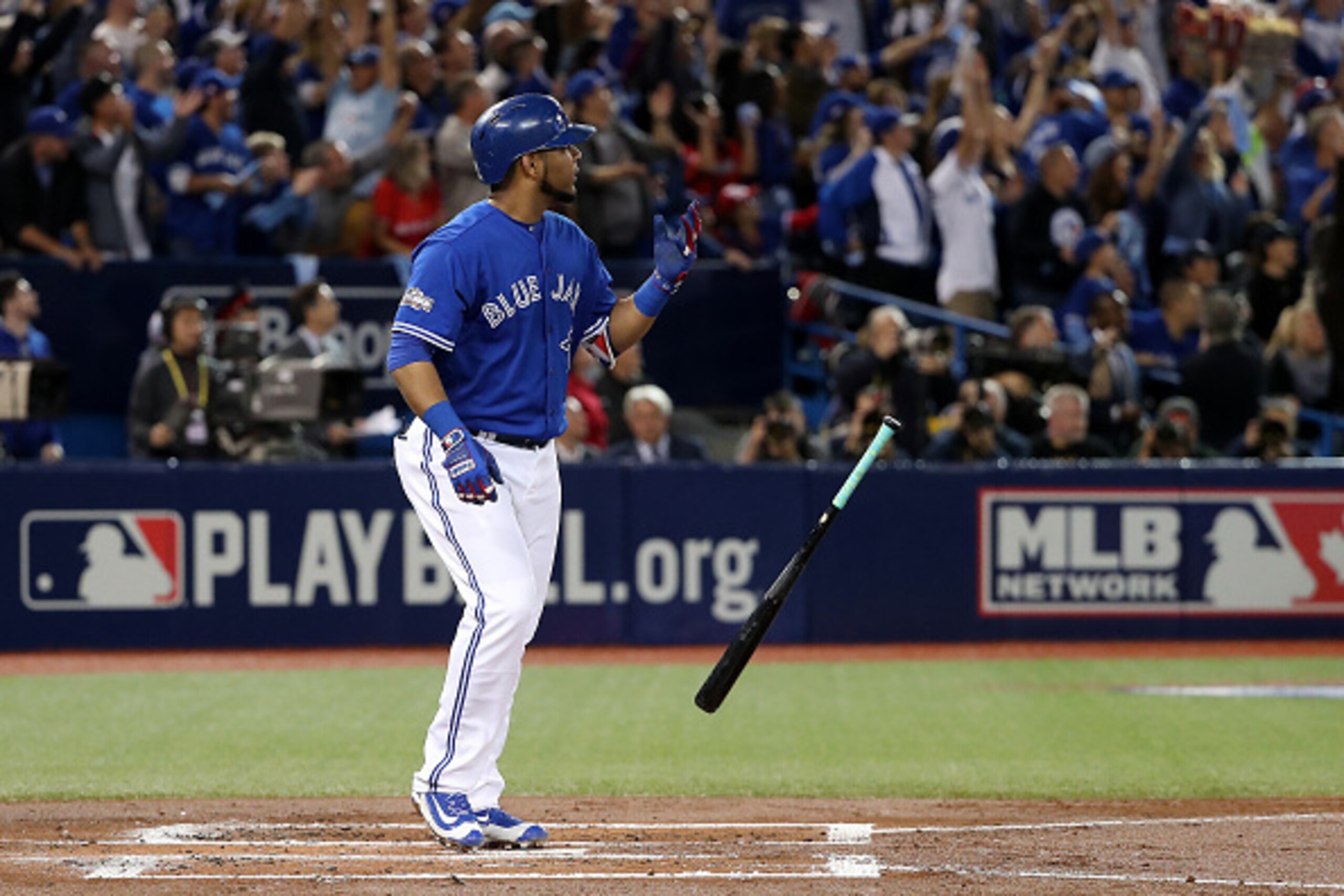 TORONTO, ON - OCTOBER 9: Edwin Encarnacion #10 of the Toronto Blue Jays hits a two run home run in the first inning against the Texas Rangers during game three of the American League Division Series at Rogers Centre on October 9, 2016 in Toronto, Canada. 