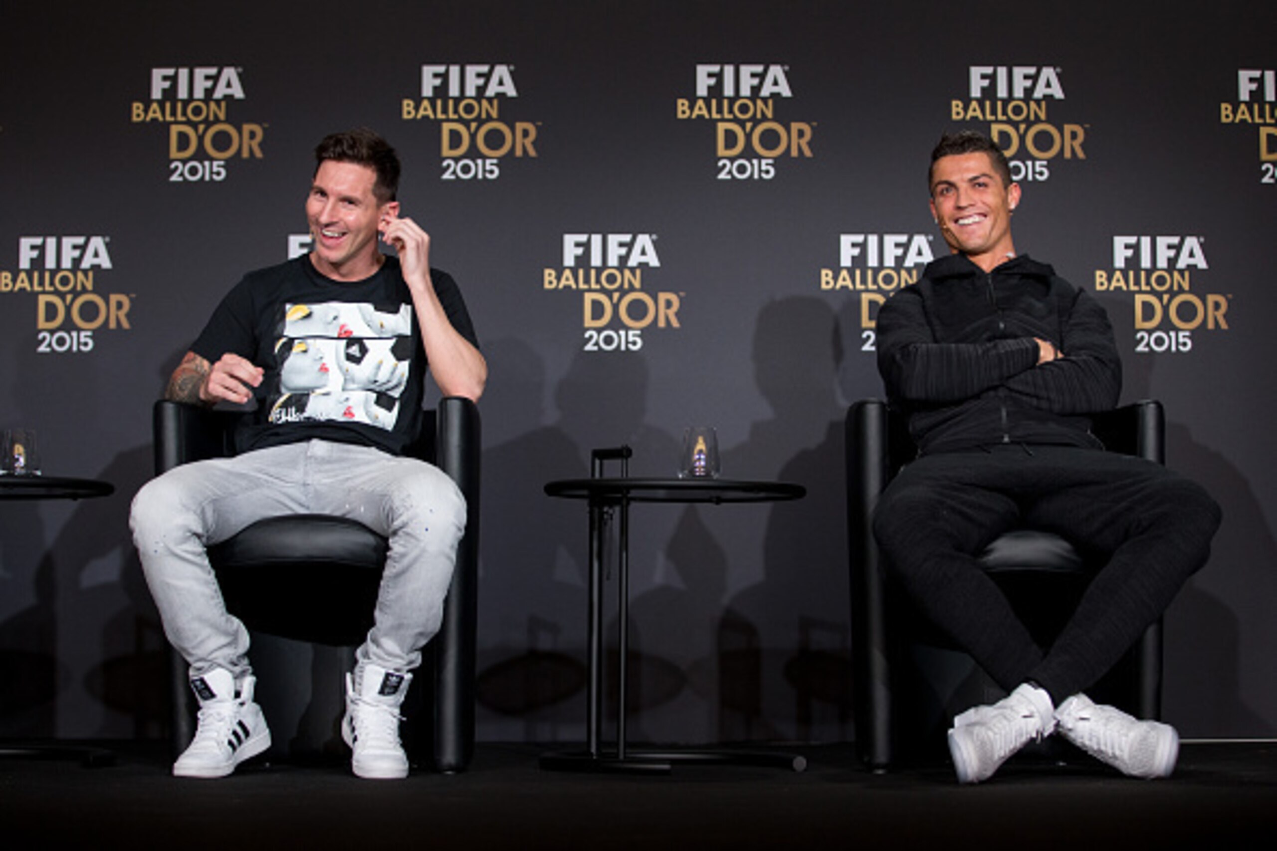 ZURICH, SWITZERLAND - JANUARY 11: FIFA Ballon d'Or nominees Lionel Messi of Argentina and FC Barcelona (L) and Cristiano Ronaldo of Portugal and Real Madrid (R) attend a press conference prior to the FIFA Ballon d'Or Gala 2015 at the Kongresshaus on Janua ZURICH, SWITZERLAND - JANUARY 11: FIFA Ballon d'Or nominees Lionel Messi of Argentina and FC Barcelona (L) and Cristiano Ronaldo of Portugal and Real Madrid (R) attend a press conference prior to the FIFA Ballon d'Or Gala 2015 at the Kongresshaus on Janua