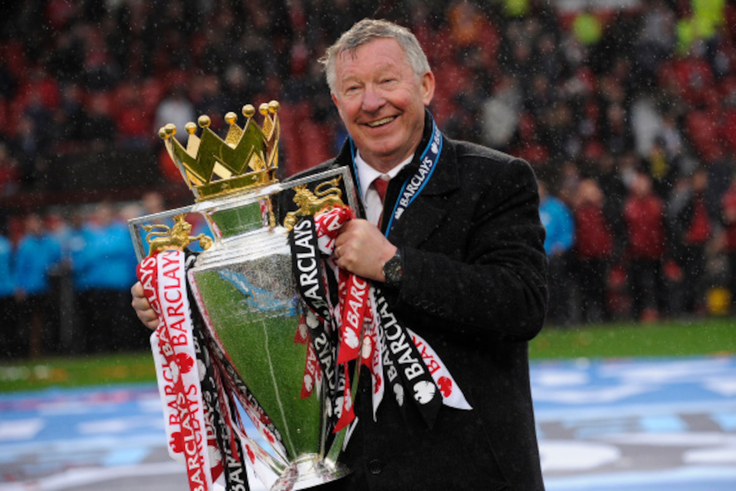 MANCHESTER, UNITED KINGDOM - MAY 12:  Sir Alex Ferguson with the Premier League trophy after the Manchester United versus Swansea City FA Premier League match, the final home game for Sir Alex Ferguson as United manager, at Old Trafford on May 12th 2013 i