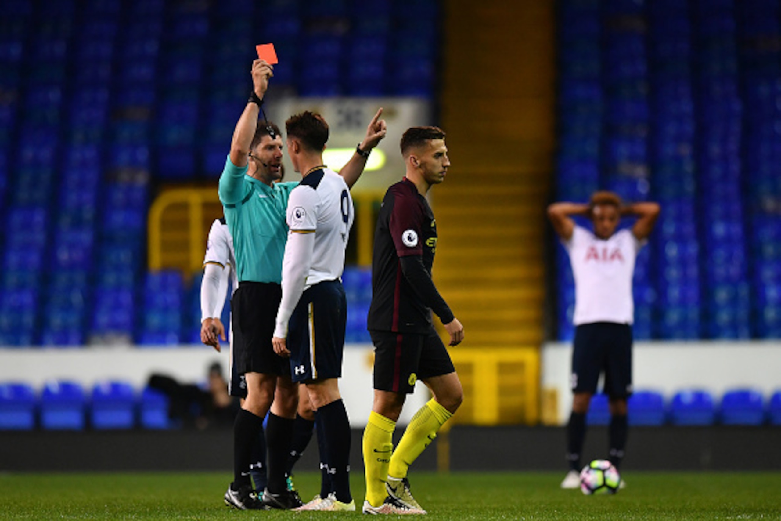 LONDON, ENGLAND - OCTOBER 14: Ryan Loft of Tottenham Hotspur is shown a red card by Referee, Neil Hair during the Premier League 2 match between Tottenham Hotspur and Manchester City at White Hart Lane on October 14, 2016 in London, England. (Photo by D LONDON, ENGLAND - OCTOBER 14: Ryan Loft of Tottenham Hotspur is shown a red card by Referee, Neil Hair during the Premier League 2 match between Tottenham Hotspur and Manchester City at White Hart Lane on October 14, 2016 in London, England. (Photo by D