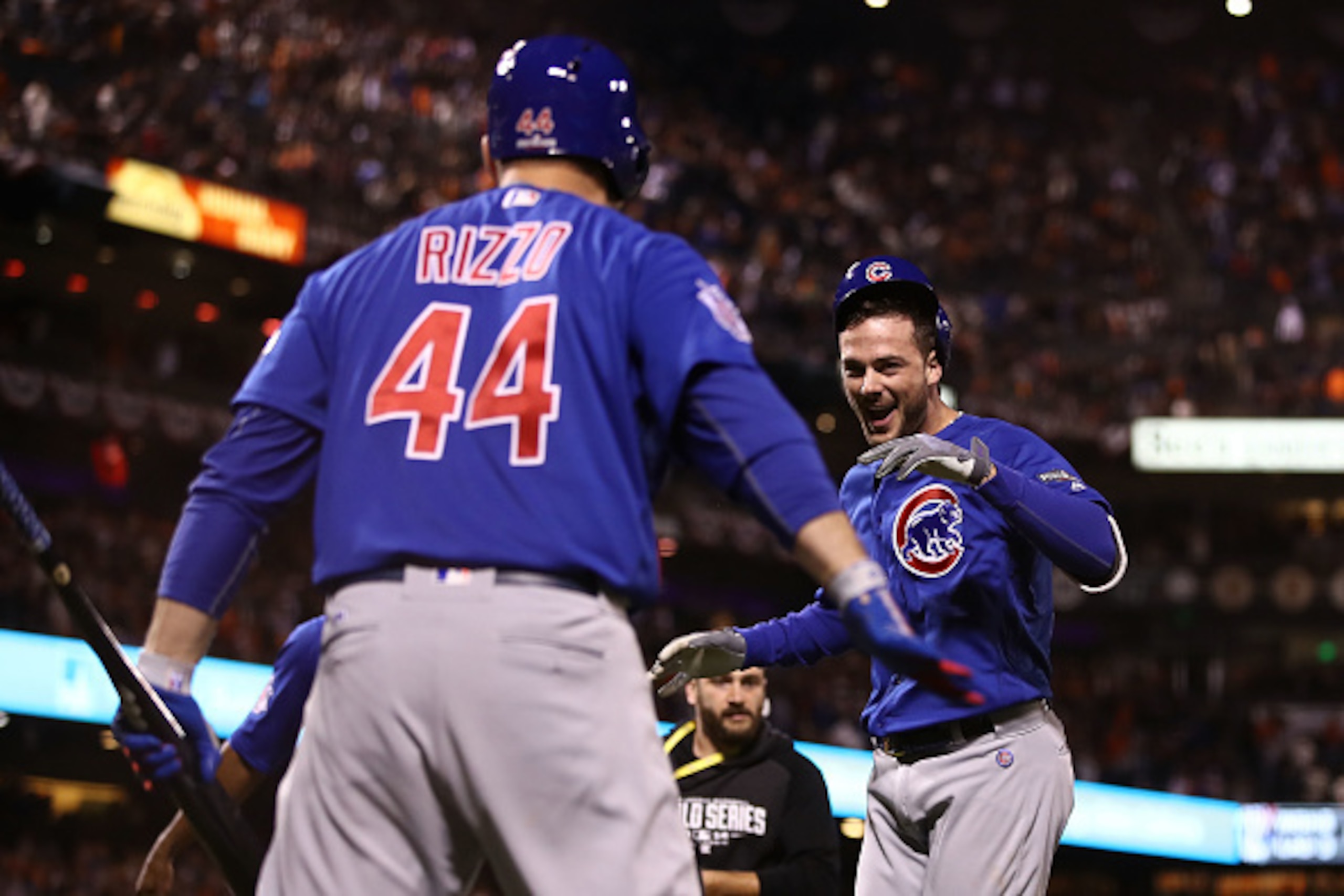 SAN FRANCISCO, CA - OCTOBER 10:  Kris Bryant #17 of the Chicago Cubs celebrates with Anthony Rizzo #44 after hitting a two-run home run in the ninth inning against the San Francisco Giants during Game Three of their National League Division Series against