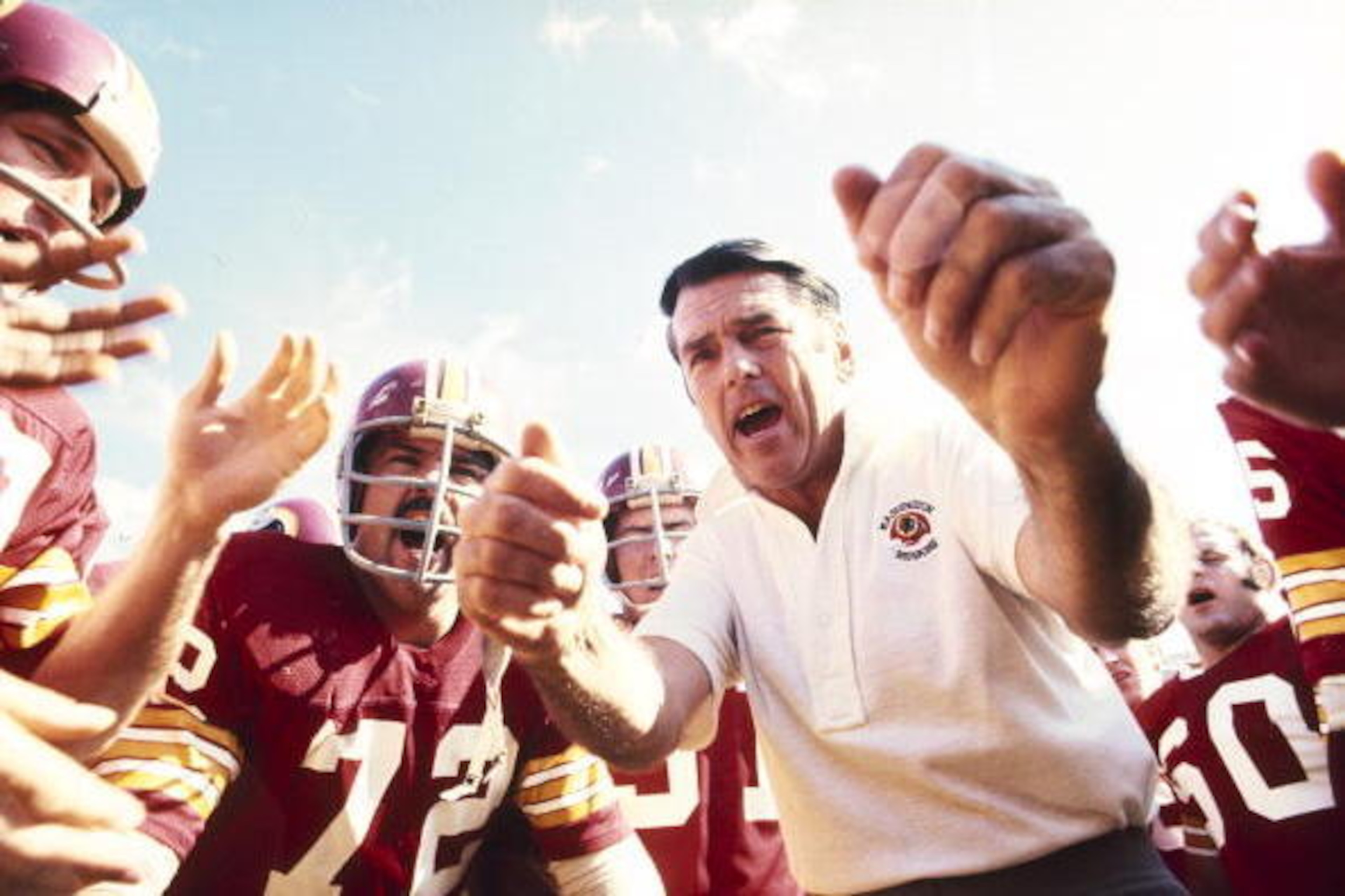 WASHINGTON D.C. - 1975:  Hall of Fame head coach George Allen of the Washington Redskins delivers his pregame pep talk before a 1975 game in Washington D.C. (Photo by Nate Fine/Getty Images) *** Local Caption ***