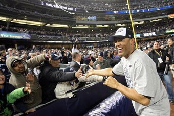 NEW YORK - NOVEMBER 04:  Mariano Rivera #42 of the New York Yankees celebrates with the fans after their 7-3 win against the Philadelphia Phillies in Game Six of the 2009 MLB World Series at Yankee Stadium on November 4, 2009 in the Bronx borough of New Y