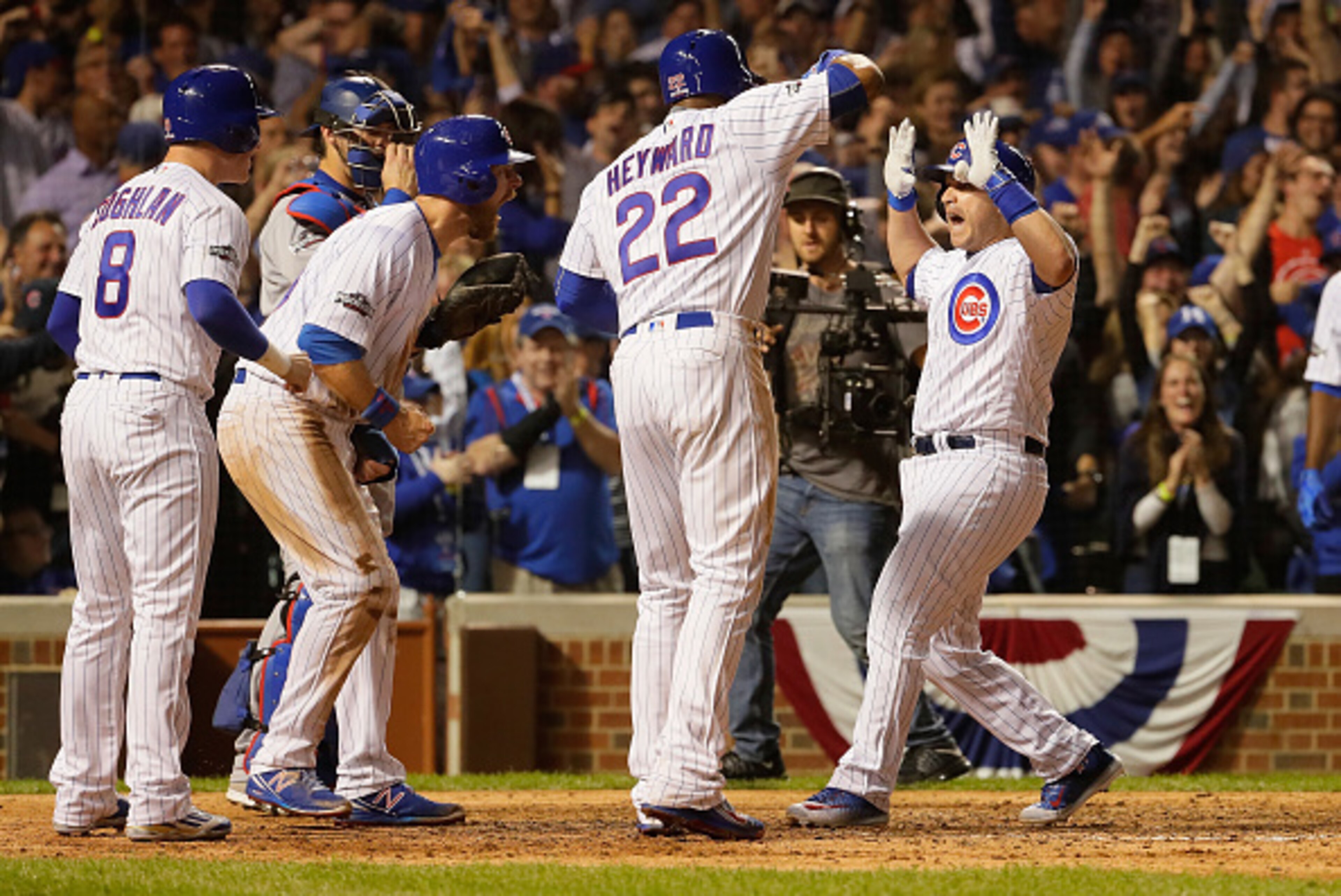 CHICAGO, IL - OCTOBER 15:  Miguel Montero #47 of the Chicago Cubs celebrates with Jason Heyward #22, Chris Coghlan #8 and Ben Zobrist #18 after hitting a grand slam home run in the eighth inning against the Los Angeles Dodgers during game one of the Natio