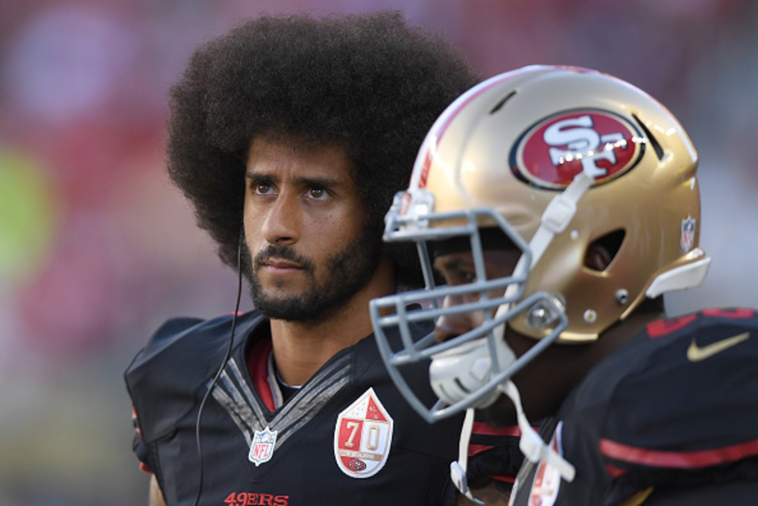 SANTA CLARA, CA - OCTOBER 06:  Colin Kaepernick #7 of the San Francisco 49ers looks on from the sidelines against the Arizona Cardinals during their NFL football game at Levi's Stadium on October 6, 2016 in Santa Clara, California.  (Photo by Thearon W. H